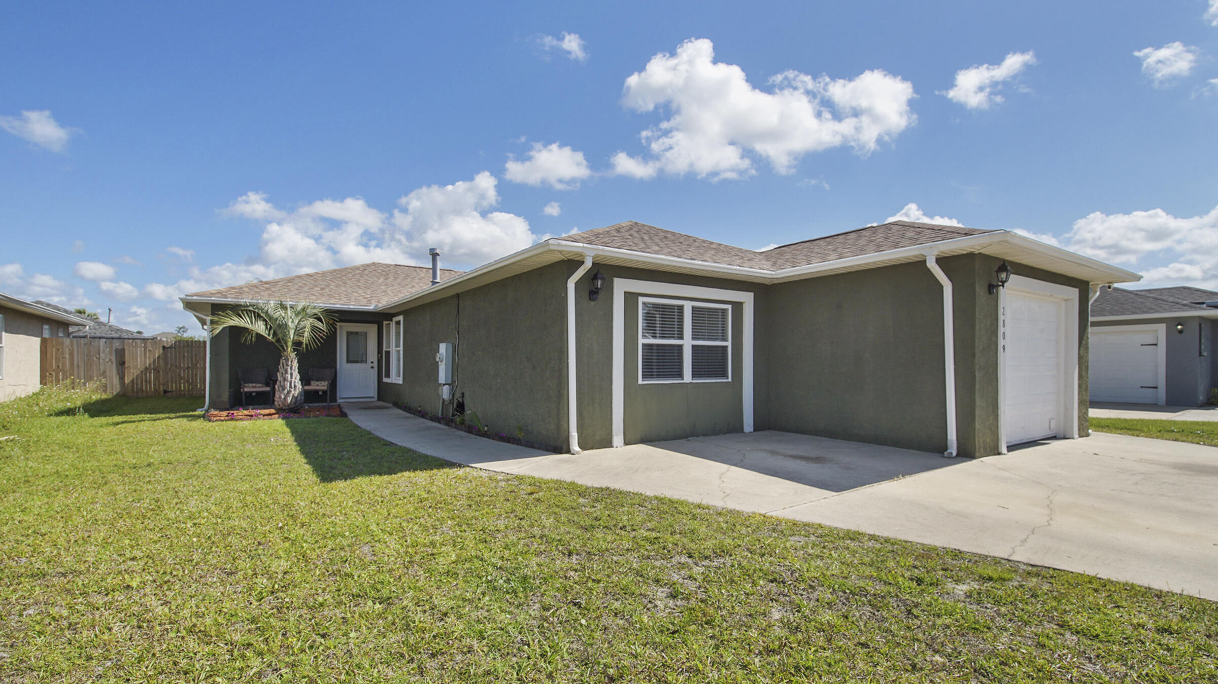 Beautiful one level home offers great split floor-plan with wood-look tile flooring in main living areas, remodeled kitchen with wrap around cabinets and newer appliances, new windows throughout, new roof (2018), a mud and laundry room that would be the envy of anyone, one car garage, and fenced backyard. Less than 15 miles to Panama City Beach access.