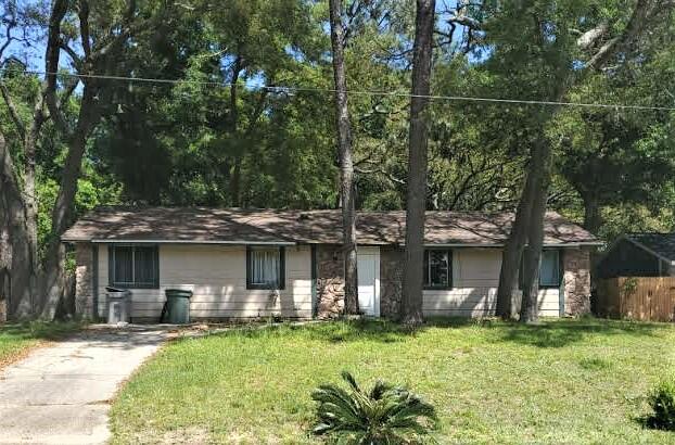 Welcome Home to this cute ranch style home that offers an open floor plan with a vaulted ceiling in the main living area making this home feel even more spacious than it's actual stated square footage! New Roof in 2019! Large windows throughout and the sliding glass door in the living room allow the sun to shine in giving you a light and bright home! The bonus room located just off the kitchen is the perfect space for lounging, hobbies, game room, gym, etc...the possible uses are endless!!! You'll love the huge laundry room just off the bonus room! The large backyard offers a sense of tranquility and privacy with the mature trees providing welcome shade from the mid day's sun!! This home is ready for your special touch to make it your own!! Welcome Home to Bridgedale Road!