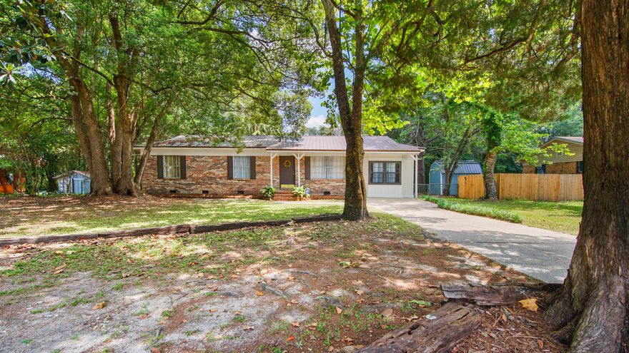 Well kept home in the city limits, on almost 2/3 acre and close to parks, groceries and downtown DeFuniak Springs. The home is open while still maintaining private spaces. The kitchen has been updated with fresh, white paint, has good cabinet and counter space, and is open to the dining area. You won't be disappointed in the completely updated bathroom with new vanity, shower/tub combo and all fixtures. The separate den/flex space with separate side entry, presently serves as a spacious home office, or could also be a nice space for a home gym, extra sleeping quarters, or even transformed into a beautiful master suite. The large, level fenced back yard has tons of options - play equipment, pool or whatever you can dream up. Home has had pre-inspection & is ready to go!