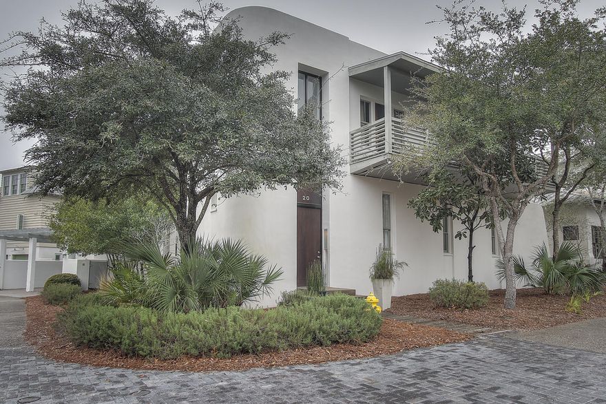 CONCRETE home on LARGE CORNER LOT in ROSEMARY BEACH! This modern home features unique dcor, ABUNDANT NATURAL LIGHT, large 2nd level balcony & plenty of outdoor space. The living area NANO DOORS EXTEND THE LIVING AREA TO THE COVERED PATIO and large PRIVACY FENCED YARD WOTH AMPLE ROOM TO ADD A POOL & CARRIAGE HOUSE! All bedrooms are on the 2nd floor while the 1st floor is built for entertaining. Enter through the 2 story foyer filled with natural light opening to the living & dining area. Plush, oversized seating welcomes you to the relaxing living area w/ sliding Nano doors to seamlessly blend indoor/outdoor spaces. The dining area with seating for 8 sits just off the stylish kitchen w/ Jenn-air appliances. With BUILT IN FRIDGE, DOUBLE OVENS, GAS RANGE & AMPLE HIDDEN STORAGE the kitchen