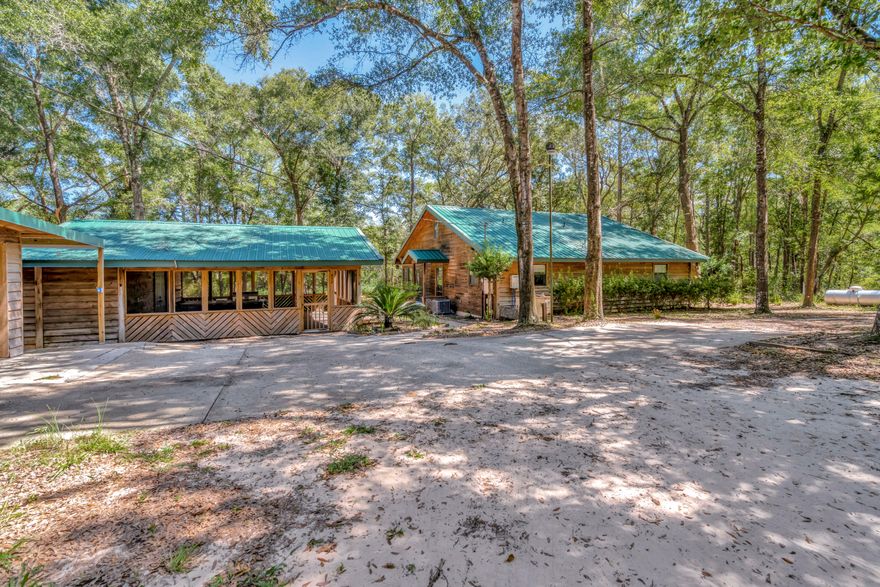 Back on market no fault to seller.**1/2 MILE DIRT ROAD** SUV/TRUCK NECESSARY**  Experience the cabin life! Pictures do not do this cabin justice! If you are looking for an escape from the chaos, and into tranquility, you have found the right place. This is a rare opportunity to own and experience cabin life in Florida. Three acres of property, along with four separate buildings make this cabin feel a lot larger than it is. All the necessary precautions, title-work, survey (included) and electric wiring have all been handled. New HVAC system and wiring. Newer plumbing as well. ALL Appliances and a Reverse Osmosis Water System, newer Carpet, floor planks and open concept and an updated bathroom.Willing to hear owner financing offers minimum 25% down at 5 year balloon