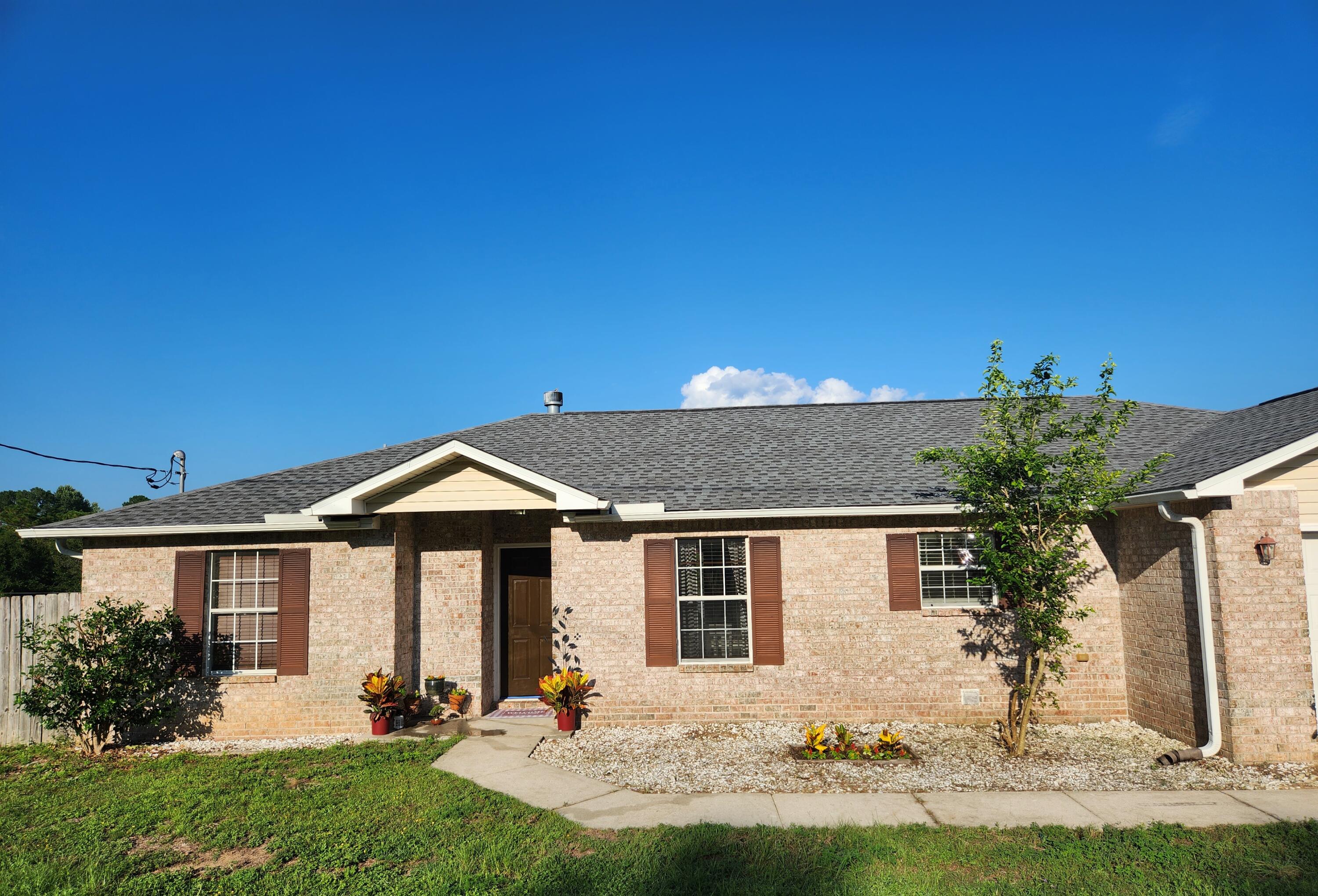 Wonderful 3 bed, 2 bath Ranch style home on 1/4 acre in Country View Estates located South of I-10 close to bases, schools, shopping and dining.  Wood-look tile flooring in living, dining, and kitchen areas. Fresh paint throughout.  The living room welcomes you with vaulted ceilings and a cozy wood burning fireplace. The galley kitchen showcases stainless steel appliances and a great breakfast nook overlooking the back yard. Split floor plan offers guest rooms and a restroom on one side and Owner's suite on the other. Main bath has dual vanities, two closets and a tub/shower combo. Separate laundry off kitchen AND formal dining space. NO HOA, new roof March 2020 and paid off solar panels make this a perfect home to see today!!!