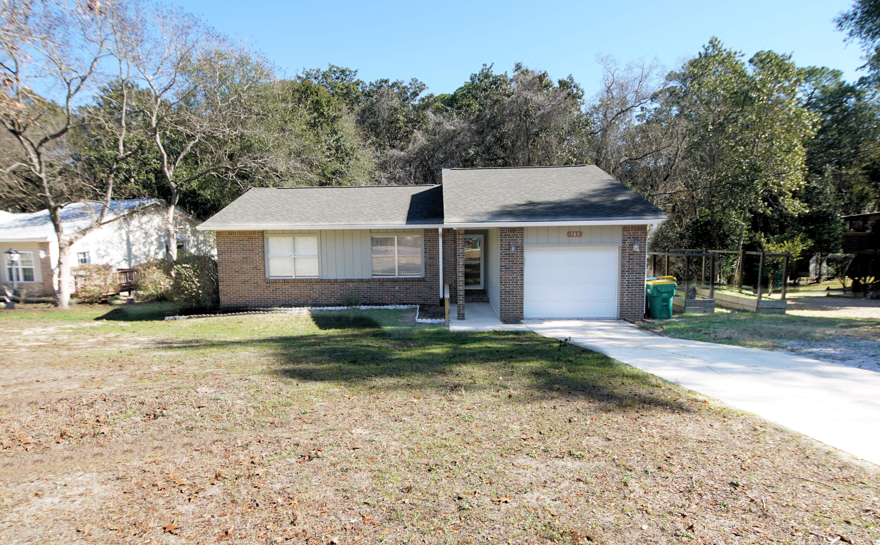 Nice home located in Niceville's central Creekside neighborhood. Living area is open to the dining room with sliding glass doors to a large deck overlooking the backyard. Kitchen includes custom cabinets and stainless steel appliances. Primary suite includes a large walk-in closet, ensuite bath and overlooks the backyard. Two additional bedrooms share an updated guest bath. Vinyl plank flooring installed Jan 2024, NO carpets. Cul-de-sac location, large backyard that backs up to a greenbelt, and a one car garage complete the package. Close to Niceville High School, Ruckel Middle School, shopping and parks.