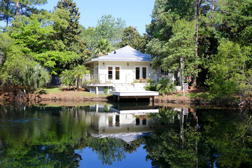 Beautifully remodeled 3 bedroom lake-front home offering the privacy of being tucked away, while also being conveniently located near all of the great amenities Sandestin has! Located in the highly desired Prestwick Place, this home stays true to the Florida Cottage style architecture that Prestwick is known for. The property backs up directly to the lake, and is nestled among many mature pines, giving it a very private and tranquil nature. The enclosed lanai offers the perfect spot to sit and enjoy a cup of coffee in the morning or take in a sunset in the evening. Other great features include a terrace to the lake and a detached garage. You are an easy walk, bike ride, or golf cart ride away from golf, the Village, marina, Grand Boulevard, and all that Sandestin Resort has to offer!