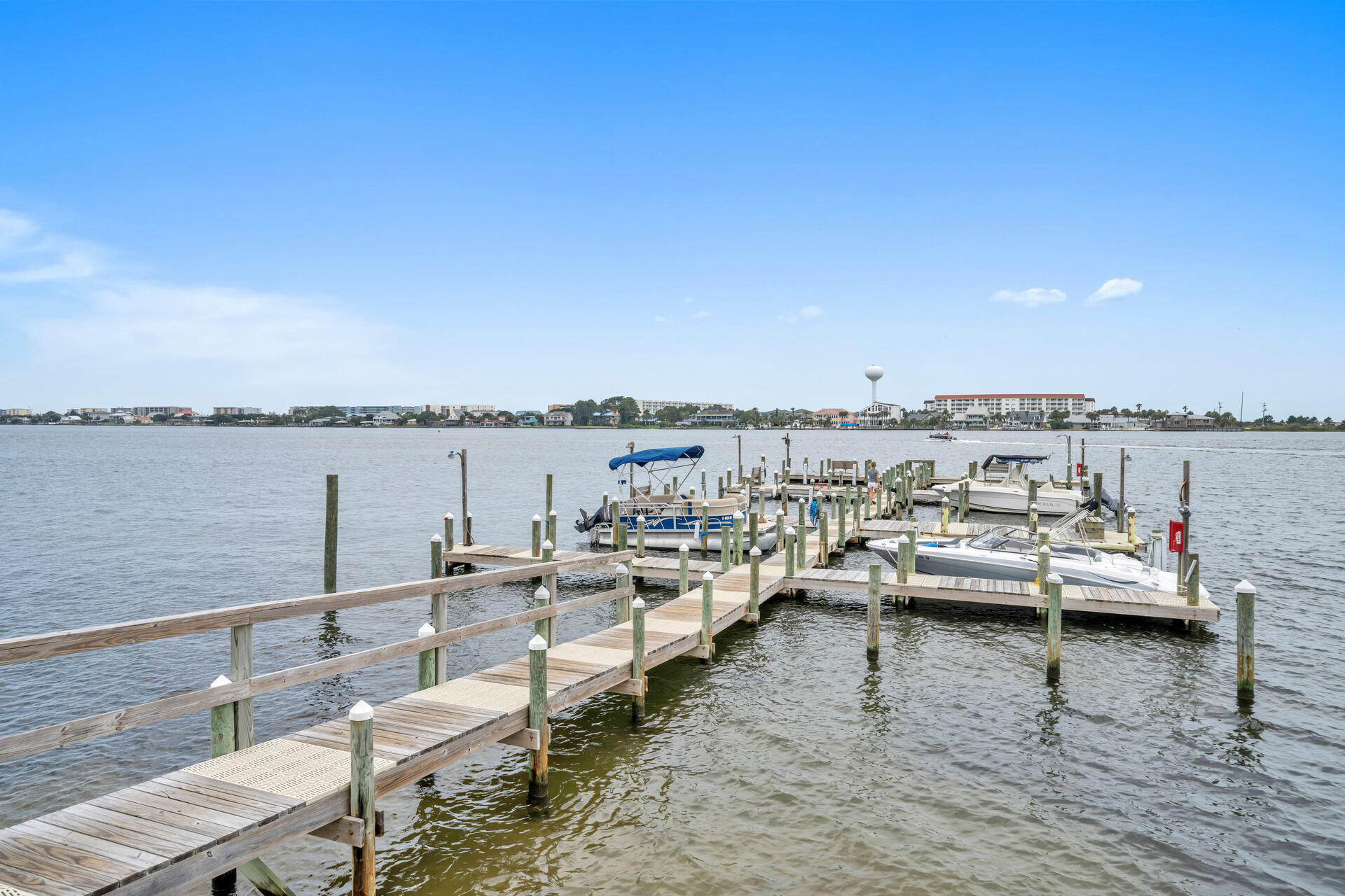 Currently rented through July 18th, Available July 19th - May 2025! Furnished Condo! Waterfront home with pool, tennis courts, boat trailer parking, and option to rent a boat slip or lift! This second-floor condo has a balcony overlooking the Intercoastal/Santa Rosa Sound, it is a corner unit with Western Sunsets. This 2 bedroom, 2 bath, and 1029 sq ft unit has updates to include a laundry inside the unit, NEW LVP flooring, stainless steel appliances, wine refrigerator, new AC, water views from living room, dining room, kitchen, and master bedroom. No pets allowed for renters, non-smoking or vaping rental, The owner prefers minimum of 3 months. Internet and electricity included in rent. TENANT/OWNER must Honor Complex & Owner Rules