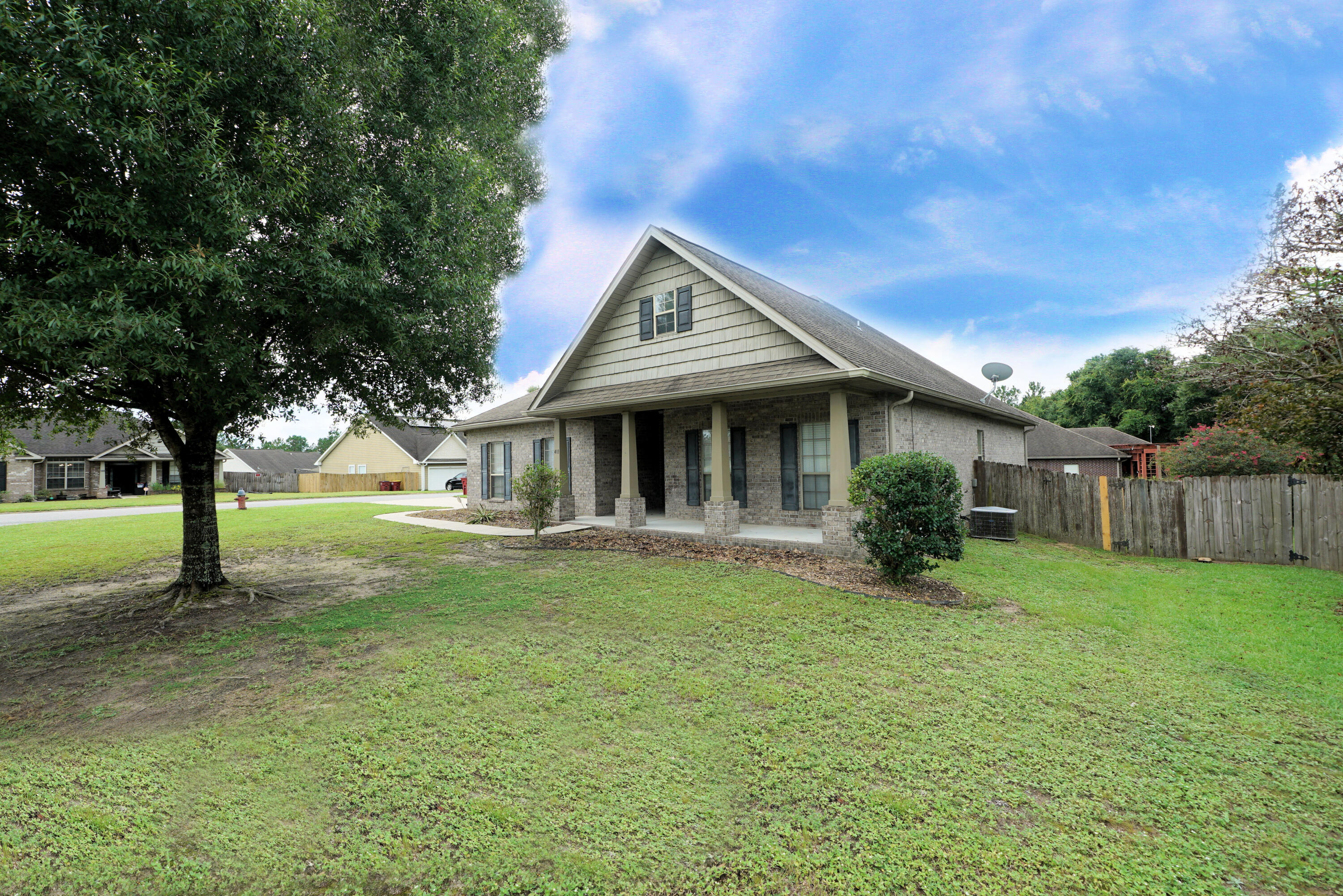 This well-maintained home is situated on a large corner lot in the desirable Rolling Ridge subdivision of Crestview. Conveniently located south of I-10, it offers an easy commute to Eglin AFB, Duke Field, and the 7th Special Forces Group complex.Featuring a large open floor plan, this home is perfect for entertaining family and friends. The split-bedroom layout ensures privacy in the spacious master suite. Exterior highlights include a covered back patio overlooking a privacy-fenced backyard, ideal for relaxing or entertaining outdoors. The side-entry two-car garage is complemented by a wide driveway with plenty of additional parking.Don't miss the opportunity to make this charming, convenient