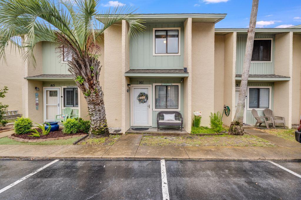 Beautifully decorated and recently updated 2 Bedroom and 1.5 Bathroom townhouse located in Gulf Highlands Beach Resort - one of the most popular family oriented resorts in Panama City Beach. No waiting for an elevator or looking for parking spot in an enormous parking garage here! This particular unit is one of the closest ones to the pool area, gym, and to beach access. Not one but 2 assigned parking spaces right outside of your front door! Hard surface flooring throughout, no carpet anywhere. Gulf Highlands Beach Resort is a gated community, offers many amenities including a Beachside Pool & Clubhouse, 11 other pools (5 Heated), 4 tennis courts (2 Lighted), 18 Hole Mini Golf, shuffle boards, dedicated beach access with beachside pool and clubhouse. WiFi internet included HOA fee.