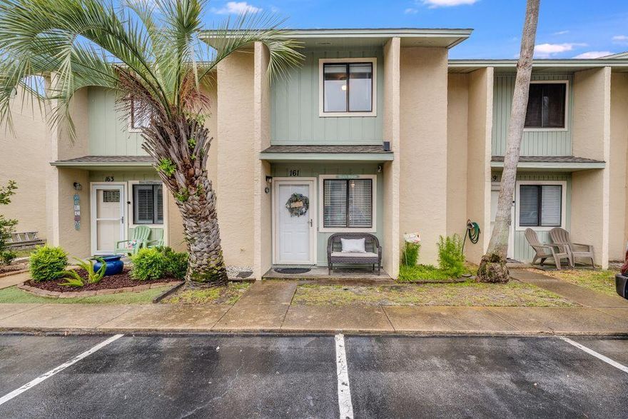 Beautifully decorated and recently updated 2 Bedroom and 1.5 Bathroom townhouse located in Gulf Highlands Beach Resort - one of the most popular family oriented resorts in Panama City Beach. No waiting for an elevator or looking for parking spot in an enormous parking garage here! This particular unit is one of the closest ones to the pool area, gym, and to beach access. Not one but 2 assigned parking spaces right outside of your front door! Hard surface flooring throughout, no carpet anywhere. Gulf Highlands Beach Resort is a gated community, offers many amenities including a Beachside Pool & Clubhouse, 11 other pools (5 Heated), 4 tennis courts (2 Lighted), 18 Hole Mini Golf, shuffle boards, dedicated beach access with beachside pool  and clubhouse. WiFi internet included HOA fee.