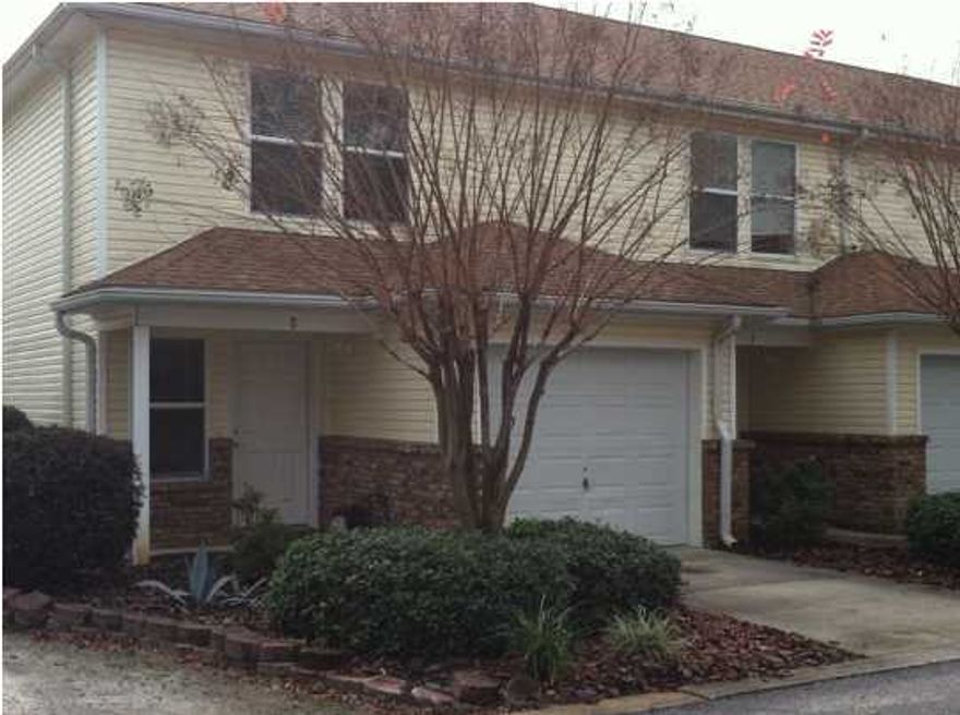 CUTE END UNIT TOWNHOME CLOSE TO BOTH BASES & CLOSE & CONVENIENT TO SCHOOLS, SHOPPING & RESTAURANTS! Carpet & tile flooring throughout. 1/2 bath downstairs for guests. 2 master suites upstairs w/ walk in closets! Washer & dryer closet upstairs between the 2 bedrooms. All appliances in place! Nice breakfast bar & open living/dining/kitchen combo. Open back patio! 1 car garage to park your car or to store your extra stuff w/ auto opener! All electric! Ceiling fans in all the rooms!