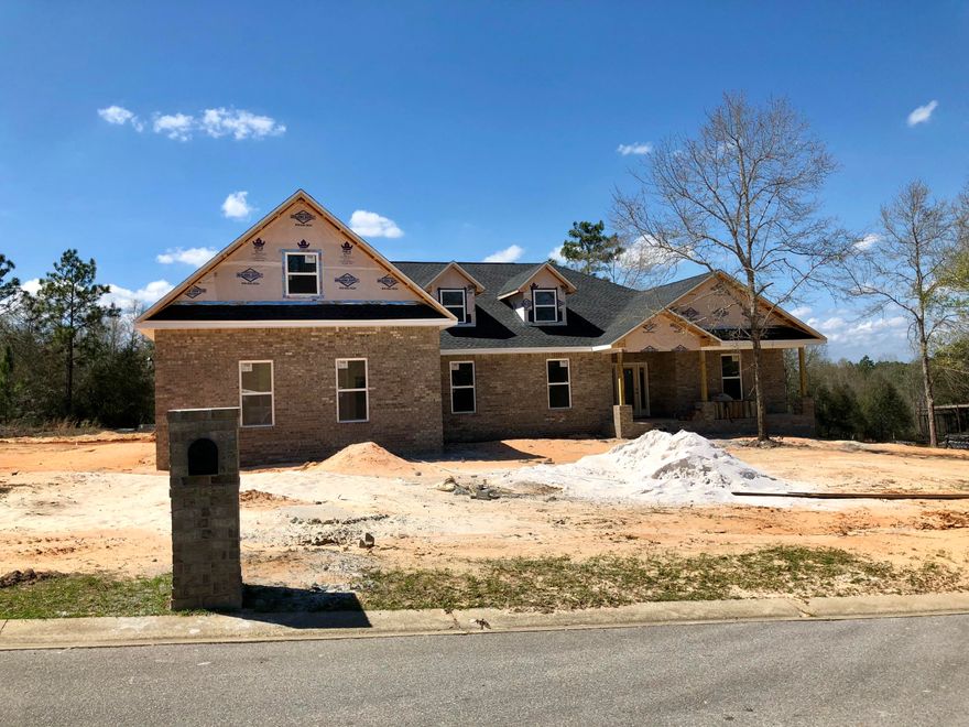 Brand New Construction with in Carnegie Hills PH II with 3 car garage, all brick home on large .51 Acre lot with expansive view. This open floorplan features 4 bedrooms downstairs and a 5th bedroom and bonus room upstairs. Kitchen features island and stainless steel appliances. The master bedroom is downstairs and has door to access the covered back porch. The flooring is easy care vinyl plank, cultured marble bathroom counter tops and shower, and lots of functional space for large families or anyone wanting room to spread out.