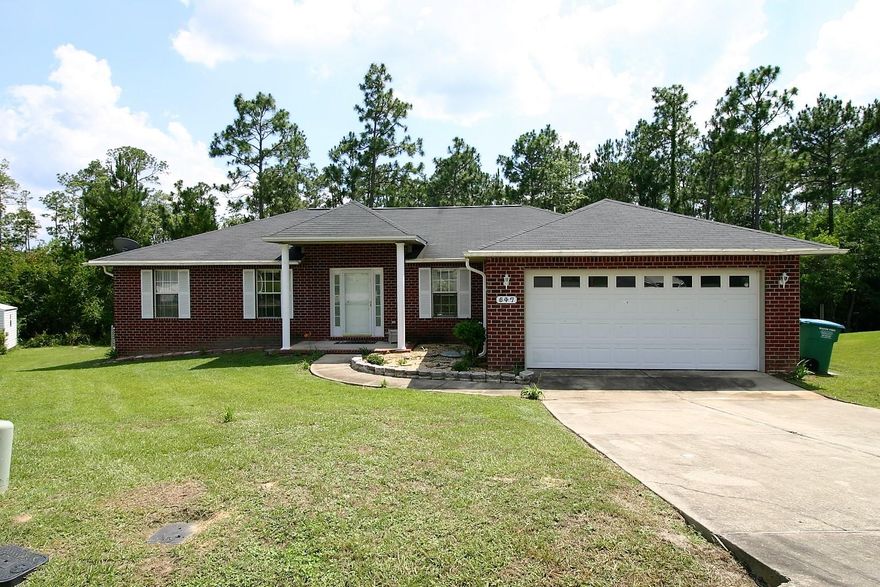 Attractive, functional home, centrally located to all things relevent. Close to shopping, dining, medical facilities and main roads in and out of Crestview. This home features a spacious living room with corner fireplace, formal dining area and breakfast nook, office/study and 3 spacious bedrooms. It sits on over an acre at the back of a cul-de-sac. There's even a stream somewhere in the woods behind the house. A portion of the backyard is fenced for pets or small children, but the house sits on over an acre. This is a nice home and it is ready for a quick move-in. Call to see it today!