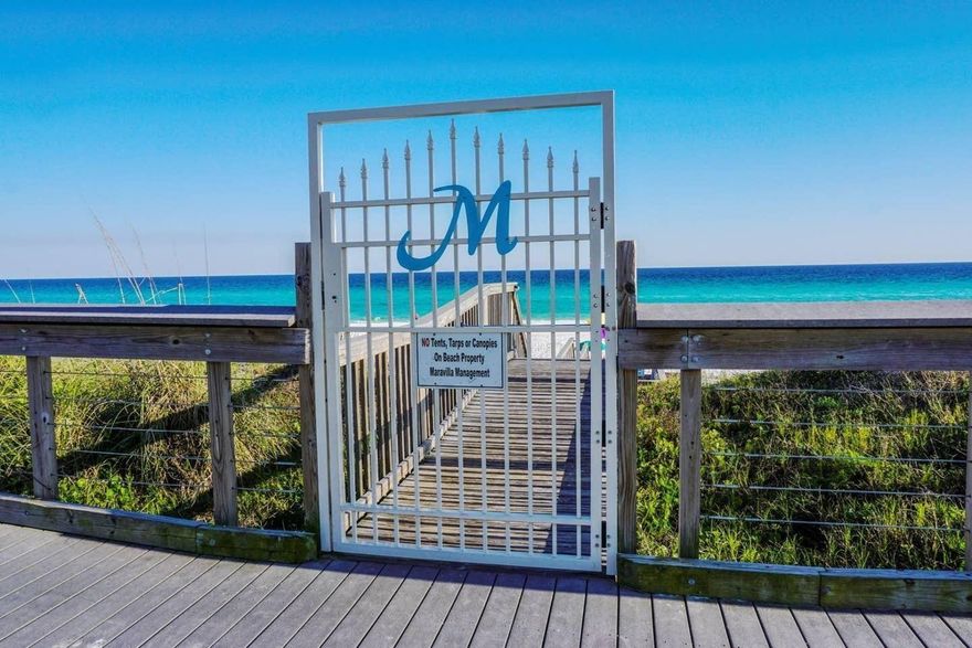 LOCATION, LOCATION, LOCATION! The two building at Maravilla sits parallel to the beach and overlooks the beautiful Gulf of Mexico which makes this condo a RENTAL MONSTER! This ground floor turn-key property gives easy access to the pool, beach and you have incredible views of the Gulf.  The condo has 1-bedroom w/ Hall Bunks and 2-bathrooms so there is plenty of room for family and friends. The living space is tastefully outfitted and has a sleeper sofa. As an added bonus this unit has a washer and dryer. Maravilla is PET FRIENDLY! You will love all the amenities