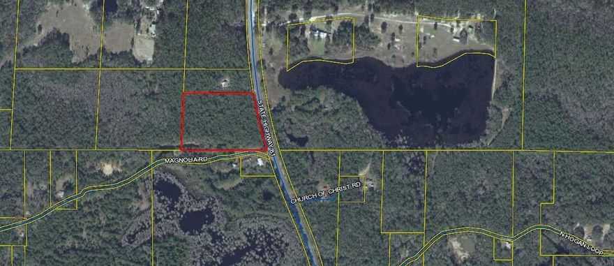 Large lot 6.2 acres 478 feet frontage on Hwy 81693 feet frontage on Magnolia Rd. Great building site opportunity to sub divide.