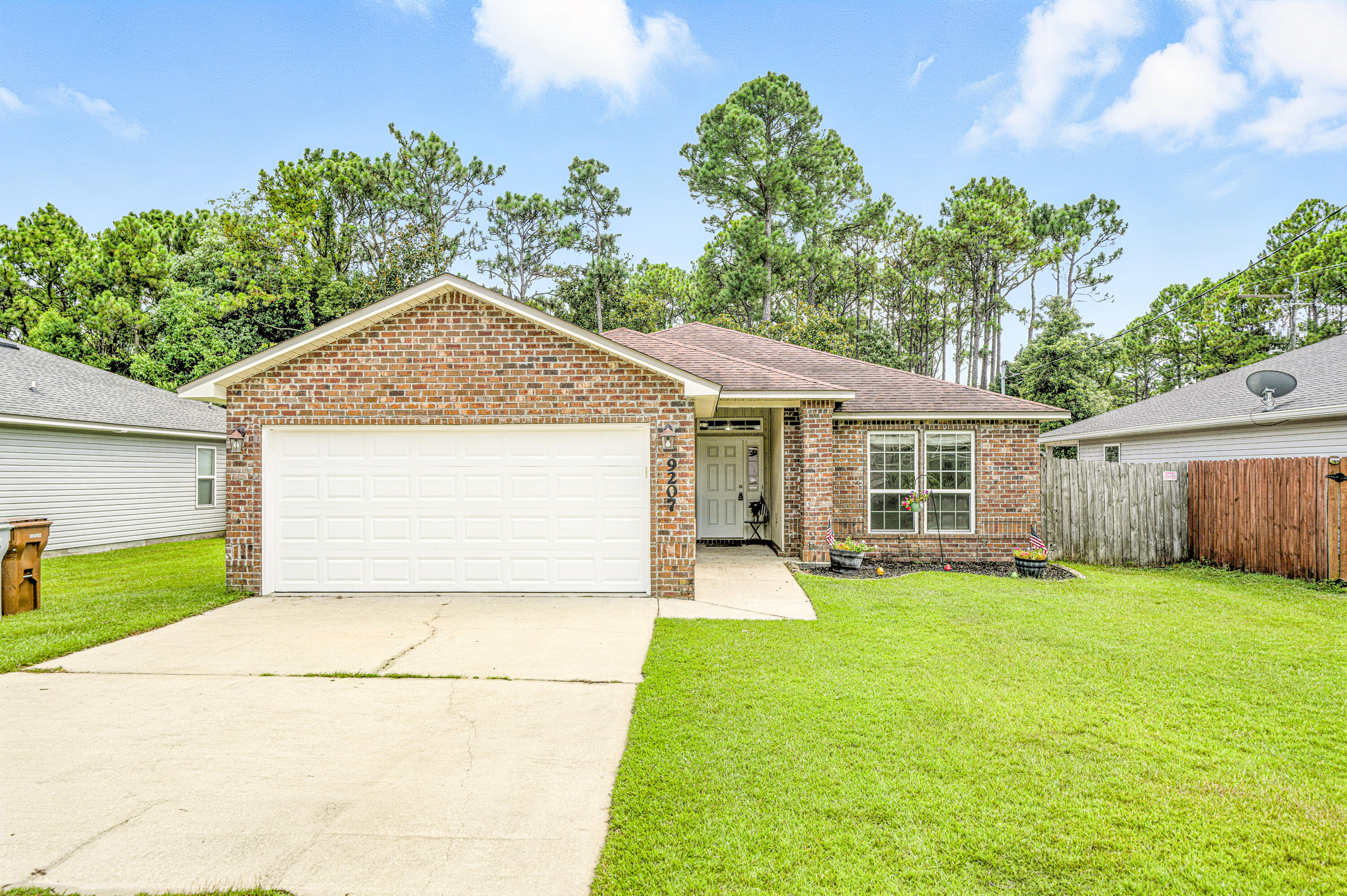 Charming Coastal Living at 9207 Timber Lane | Navarre, FL 32566Welcome home to this delightful 4-bedroom, 2-bath beauty nestled on a quiet dead-end street in one of Navarre's most sought-after neighborhoods. Built in 2014, this lovingly maintained home is full of character and comfort, offering the perfect blend of style, function, and location.Step inside to an airy open-concept layout featuring soaring vaulted ceilings, abundant natural light, and a spacious living area made for gathering with family and friends. The kitchen is the heart of the home--complete with gleaming granite countertops, stainless steel appliances, a large breakfast bar, and plenty of cabinetry for all your culinary needs. The thoughtfully designed split-bedroom floor plan gives everyone their own space, with a generous primary suite that feels like a private retreat boasting a walk-in closet and a bright en-suite bathroom with double vanities.
Outside, the fully fenced backyard offers a peaceful escape ideal for morning coffee, weekend BBQs, or watching kids and pets play freely. You'll love the unbeatable location just minutes from Navarre Beach, local military bases, shopping, dining, and top-rated schools. Sports families will appreciate the quick access to soccer fields, the YMCA, and the Navarre Youth Sports Association.
With its quiet street, coastal charm, and move-in-ready condition, this home truly has it all.
Don't miss your chance to fall in love!