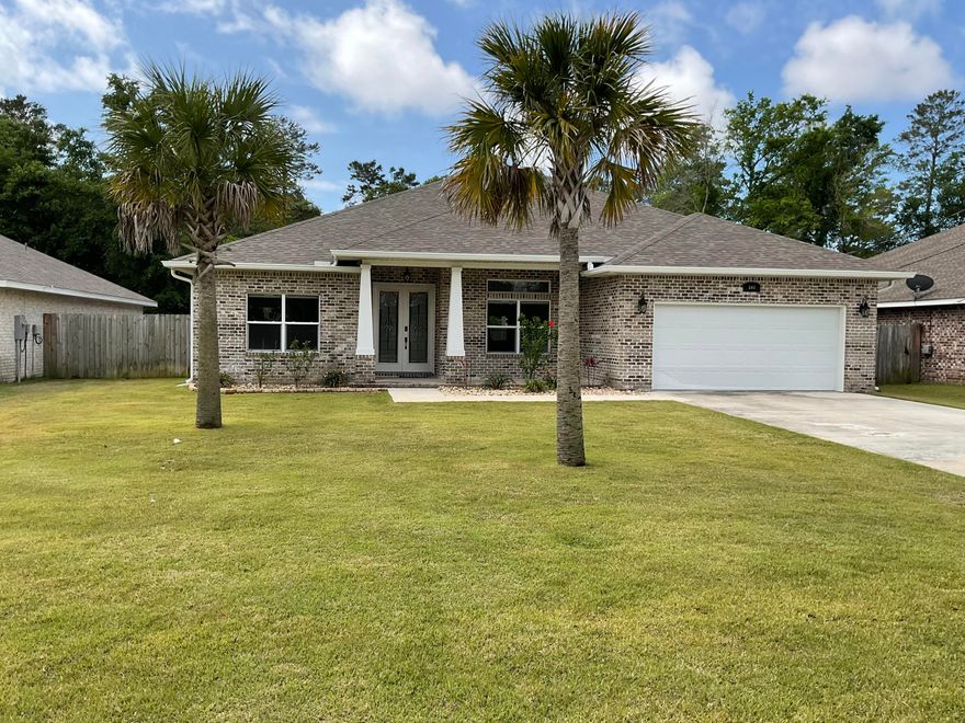 All reasonable offers will be  considered. Great location between Eglin AFB and Hurlburt Field! Built in 2018 this 4 bedroom 3 full bath all brick home sits on a 70x120 lot! Ten foot lace textured ceilings accented w/crown molding in trey ceiling living/ great room//dining room. Ceiling fans in all rooms and blinds are battery operated . All kitchen appliances remain, custom kitchen cabinets and granite counters.Nice size bedrooms, one perfect for mother-in -law/guest suite with own bath. Master suite is located on the opposite side of the home and features a huge walk-in closet, oversized shower, double vanity with granite counter tops and soft close cabinets. Back yard is privacy fenced and there is a large covered patio. Also there is a a well/pump and sprinklers.  **SEE MORE**