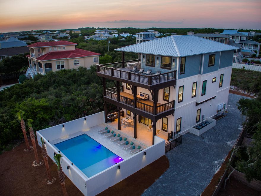 100% Designer Furnishing Package Incl. WALKING DISTANCE TO ALYS and ROSEMARY BEACH. Sleeps up to 30 in beds. $225,000+ projected gross rental income. Over $150k is pre-booked for 2017. The courtyard pool and sweeping gulf views are just the beginning of what this home has to offer. Less than 500ft from the pristine white beaches and emerald green waters of 30A. The stunning herringbone wood tile floor welcomes you into the first floor where you will find a chef's dream kitchen designed to accommodate the largest of groups. Two sinks, two dishwashers, 3 ice makers, two microwave convection ovens, and 3 refrigerators are the perfect complement to the 48'' gas range and custom vent hood. 3 HE Washer/Dryer incl. ELEVATOR goes to every floor