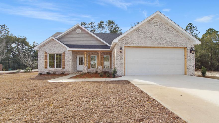 This is not a cookie-cutter build, and it shows the minute you pull up. Thoughtfully designed and fully custom, this all-brick home offers 1416SF of smart, comfortable living on a level 1/4 acre lot in Magnolia Lake Estates. With 3 beds/2 baths and a true two-car garage, every square foot was planned out carefully. Inside, the open floor plan is light and airy, thanks to the oversized breakfast-area window, it floods the home with natural light and gives the space a real warmth. The kitchen anchors the space with quartz countertops, a center island, walk-in pantry and luxury vinyl plank flooring that carries throughout the entire home. The master suite offers a walk-in closet, double vanity and custom 6' tile shower with built in bench. The laundry room deserves its own moment. It is oversized, functional, and actually useful, with cabinetry, countertops and storage most homes skip entirely. Additionally, there is mudroom space from the garage entry that is prepped and ready for you to add your custom touches like lockers or a bench. Covered front and back porches extend the living space outdoors, while details like wood columns and shutters add character and curb appeal you simply don't get from tract construction. Located within the city limits, you're minutes from schools, parks, and downtown, and still only about 35 minutes from the beach. Magnolia Lake Estates is a smaller, charming neighborhood, and offers a single entrance and exit. Bottom line, this home was built by someone who pays attention to the details and caters to what homeowners truly desire in a home. Offered at a current appraised value of $369,900. 