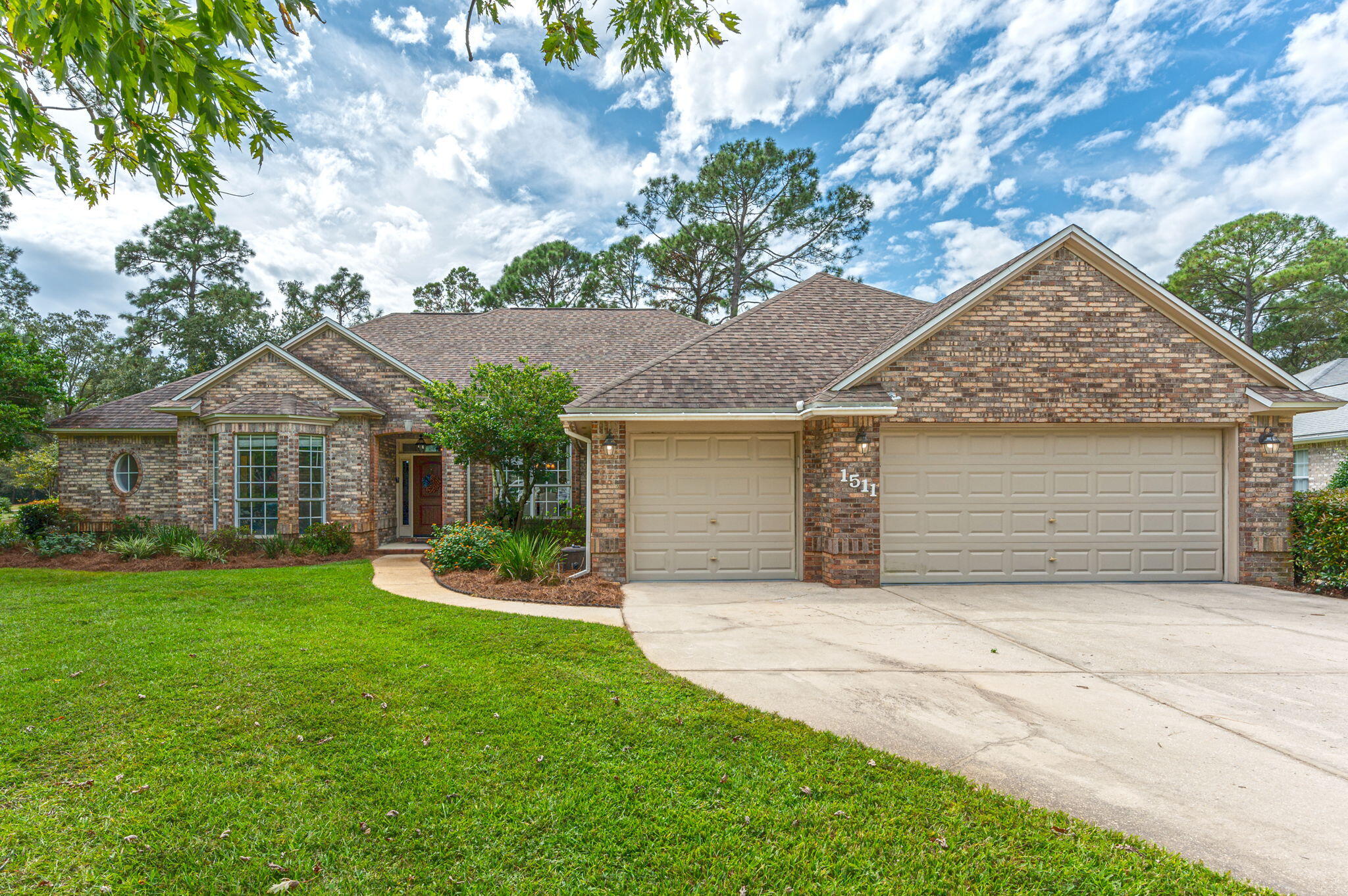 Practically Perfect on Pinehurst Cove! This Bluewater Bay beauty checks ALL the boxes! Pool? Yep. 3-car garage? Yep. 5 bedrooms? Yep. 4 bathrooms? Yep. Updated kitchens and bathrooms? Yep. Fenced yard? Yep. Screened In Pool & Spa? Yep. No HOA? Yes! And it's on over a half acre lot (.54)!!! Welcome home to this fabulous single story property located near the Bluewater Bay tennis, pickle ball, golf and pools and zoned for the top ranked Niceville schools! This rare gem boasts front yard and back yard appeal with mature landscaping, lush grass, fenced yard, screened lanai with pool/spa, and overlooks the current golf course! From the moment you open the front door you can appreciate the breath of space this floor plan offers. The foyer is open to the formal living and dining room....=>