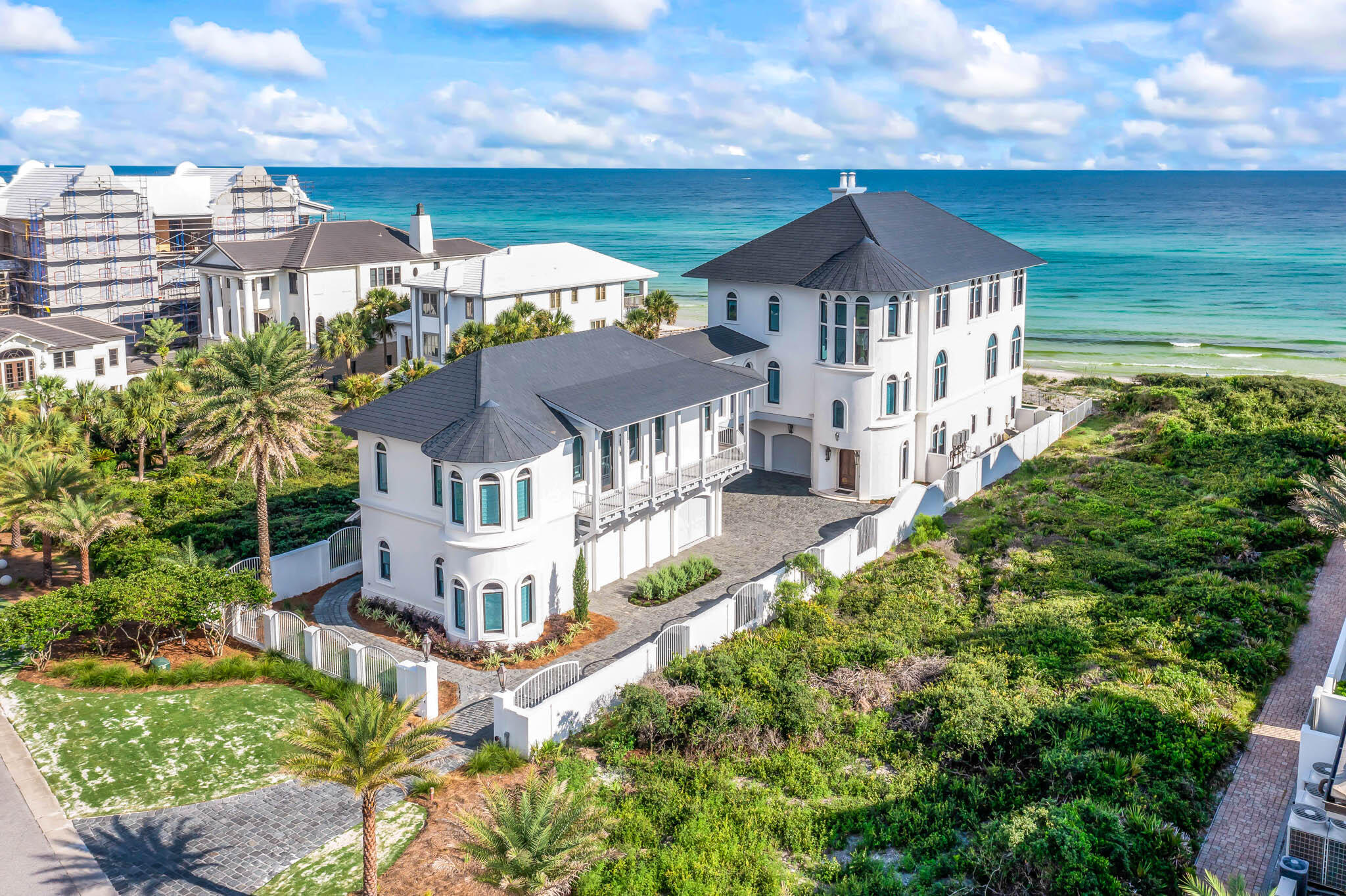 Welcome to Paradise By The Sea, the most exclusive neighborhood on 30A. 145 Paradise By The Sea is perfectly located behind the gates of this stunning community. This custom beach retreat designed by renowned architect Darrell Russell of A Boheme Design features sweeping living-dining spaces, and stunning views of the Gulf of Mexico. Natural light flows in through the floor-to-ceiling windows and illuminates the open concept living areas and high ceilings. 145 Paradise features seven bedrooms, ten bathrooms, 10,035 sq.ft heated and cooled and an additional 2,000 sq ft in porches to enjoy the breath taking views.