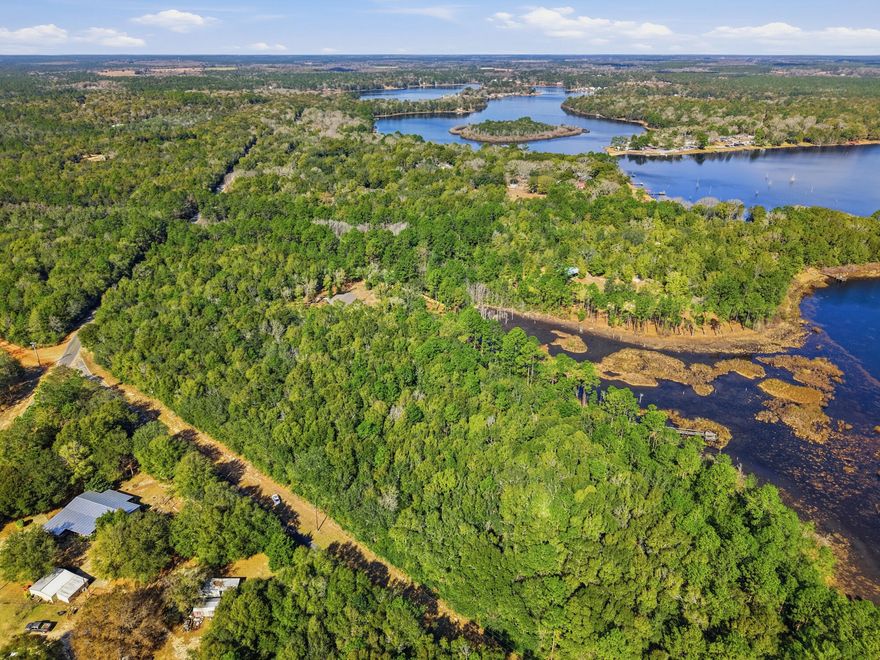 Discover the perfect blend of privacy, nature, and convenience with this beautiful 5.5-acre wooded tract featuring approximately 400 feet of waterfront on Lake Holley. With over 900 feet of paved road frontage, this property offers excellent access along with multiple potential homesites.Enjoy peaceful lake views, mature trees, and plenty of space to create your ideal home, weekend retreat, or private getaway. Whether you're looking to build now or invest for the future, this property checks all the boxes.✔️ 5.5 wooded acres✔️ Approx. 400' waterfront on Lake Holley✔️ Over 900' paved road frontage✔️ Excellent homesite potential✔️ Easy access to DeFuniak Springs & major shopping✔️ Priced right for today's market