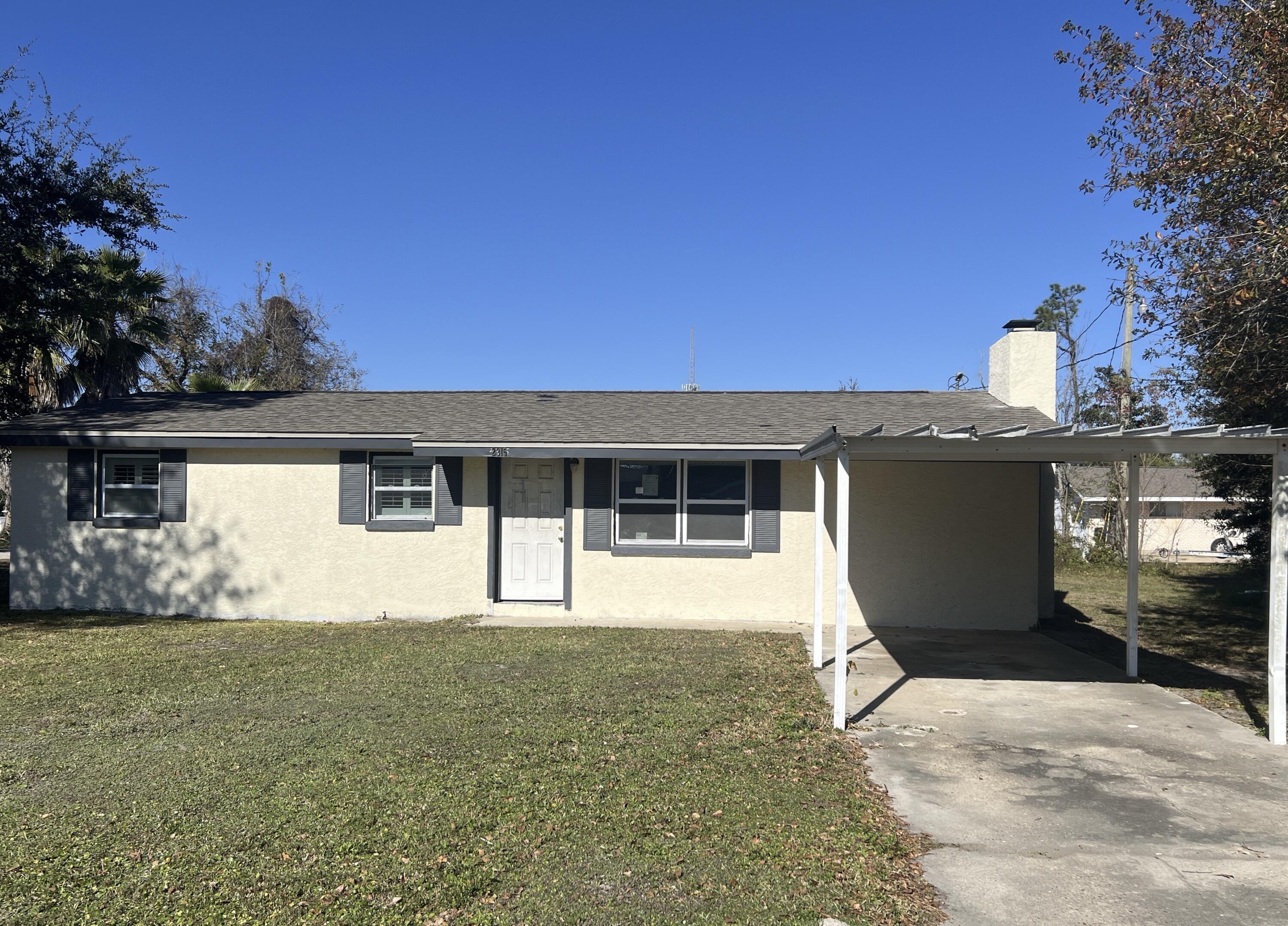 This charming 3 bedroom, 1 bath home is located in the heart of Panama City and in a family friendly neighborhood! This fully remodeled home has had recent upgrades to include - new kitchen, new countertops, appliances, fresh paint, new windows, new tile/carpet flooring throughout, and an updated bathroom! This home also features a wood burning fireplace in living room, eat in breakfast nook, and a huge backyard! come to view your new home! Built in the 50s but with an effective year in the 2000s, this HUD REO property was remodeled in the past and has a full brick fireplace. Home has block exterior, dimensional shingled roof and detached carport cover. Inside you will find indoor laundry, tiled floors and 3 bedrooms and 1 bath. Home needs some repairs and therefore will not qualify for all repairs, but home is FHA insurance with Escrows (IE). 