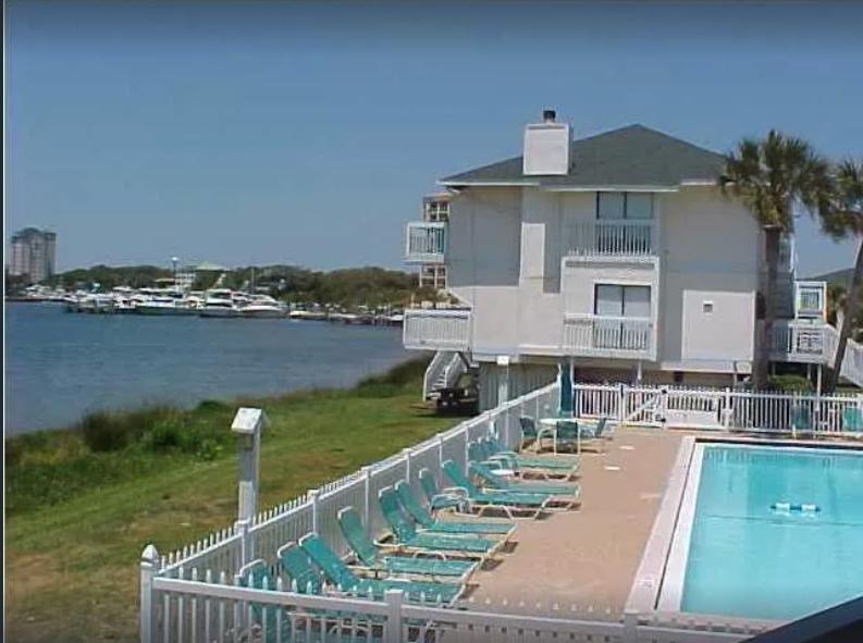 Upgraded and updated! This is a must see condo! It is a convenient first floor unit overlooking the golf course and near a nice pool.Sandpiper Cove is a low density (two story), complex. Family vacations are great with tons of amenities for your pleasure: 1100 feet of deeded beach access, 5 swimming pools (2 are heated), 3 hot tubs, 6 tennis courts (also marked for pickleball), shuffleboard, canal dockage, owners only marina for larger craft, boat ramp, snack bar in the beachfront gazebo, 9 hole executive golf course and it is home to the Louisiana Lagniappe restaurant.
