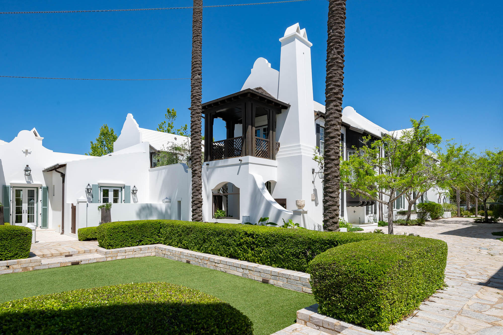 Introducing the breathtaking 35 Ladybug Court, a stunning real estate gem located in the coveted town of Alys Beach, situated on the pristine Emerald Waters of the Gulf of Mexico.  This extraordinary home offers an unparalleled coastal living experience located on the Sea Garden Walk Pedestrian Path. Spanning across an impressive 3,456 square feet, this residence boasts generous living spaces and an impeccable design. With four bedrooms, three full baths, and a convenient half bath, this home is designed to accommodate both family and guests with ease. The primary bedroom is a true oasis, offering a private and separate retreat from the other guest bedrooms. Here, you'll find a luxurious walk-in shower, a soothing soaking tub, and a spacious walk-in closet. The primary bed