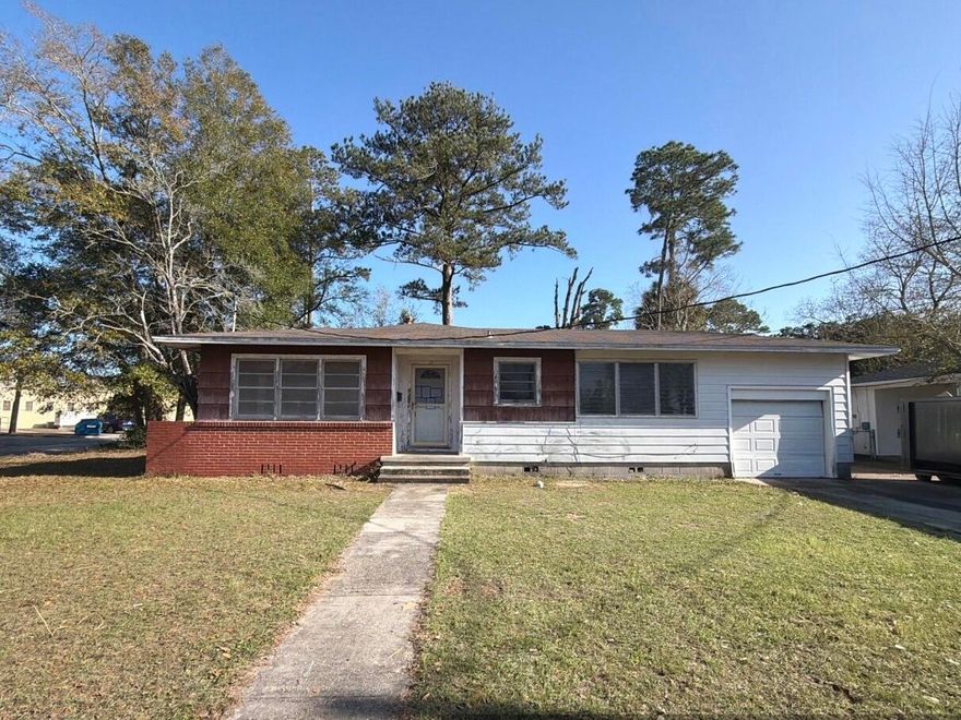 Located just a few miles from the bustling down town area and the ever active mall, hospital, and airport, this REO opportunity is just that... opportunity knocking. Built originally in the 1950s, this 3 bedroom 1 bath home rests on a large corner lot and comes with both a detached carport (with extra storage) and an attached 1 car garage. The lot is mostly fenced and is a larger corner lot. Home needs repairs and will not qualify for most financing, cash or renovation loans are best. Under FinCEN's new RRE Rule, transfers will be subject to reporting when buyers use entities or trusts to take title to residential real estate, when the transaction is all cash, privately financed or HELOC.