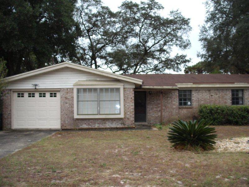 his traditional ranch style home located in Ft. Walton would make a great home for anyone. With all the new repairs, this home is like NEW and is move in ready! The home features BRAND NEW carpet, paint, stove, flat cooktop, and a/c unit!! This home also has a great one car garage, awesome backyard great for those summertime bbq's! Be sure to stop by and take a look at all this home has to offer. Now is your chance to make this home yours!