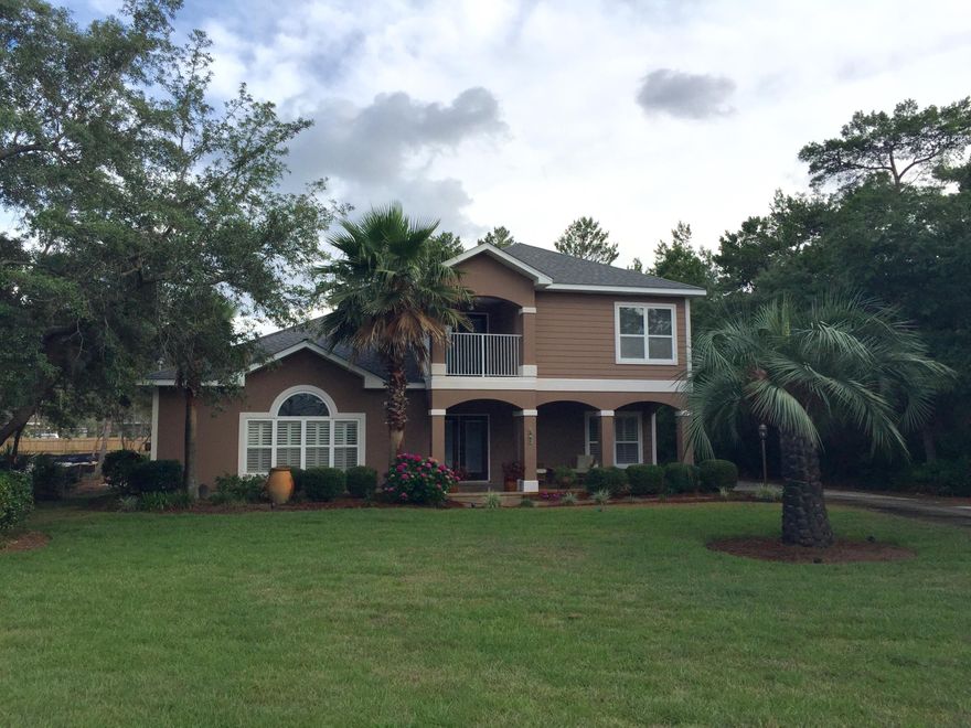 **48 Hr Right of Refusal* Beautiful bay views from this 3 bed/2.5 bath home just across the street from the Choctawhatchee Bay and minutes to shopping, restaurant's, schools and the hospital. Covered front porch to enjoy the evening sunset. Open floor plan allows for lots of entertaining. French doors opening to the screened back porch off the dining area give even more from for that fun party. Plantation shutters let lots of sunlight and views of the bay in. Wiring for a large HDTV over the gas fireplace. Built in book case to show off those treasures and books. Brand new natural red oak flooring throughout downstairs, stairs and upstairs landing. New irrigation pump 5/17.
