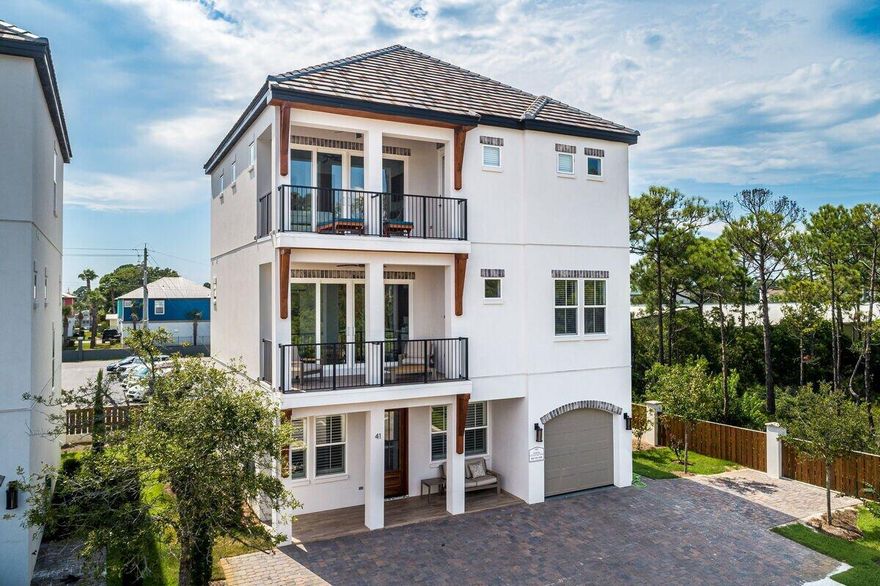 Pristine 2020 built home paired with exceptional finishes and resort style amenities. This beautiful beachside retreat boasts over $180,000 in projected annual income! 41 Mellow Way is prominently positioned just a few tiers back from the Gulf of Mexico and a short walk or golf cart ride to Miramar Beach's largest public beach access. Appointed with top of line appliances, 66'' built in fridge/freezer, quartz countertops, and hardwood floors throughout. Featuring two living rooms, 7 bedrooms, 6 & 1 half bathrooms, and two large balconies, this rental machine was thoughtfully designed to optimize sleeping capacity while giving everyone space to relax.