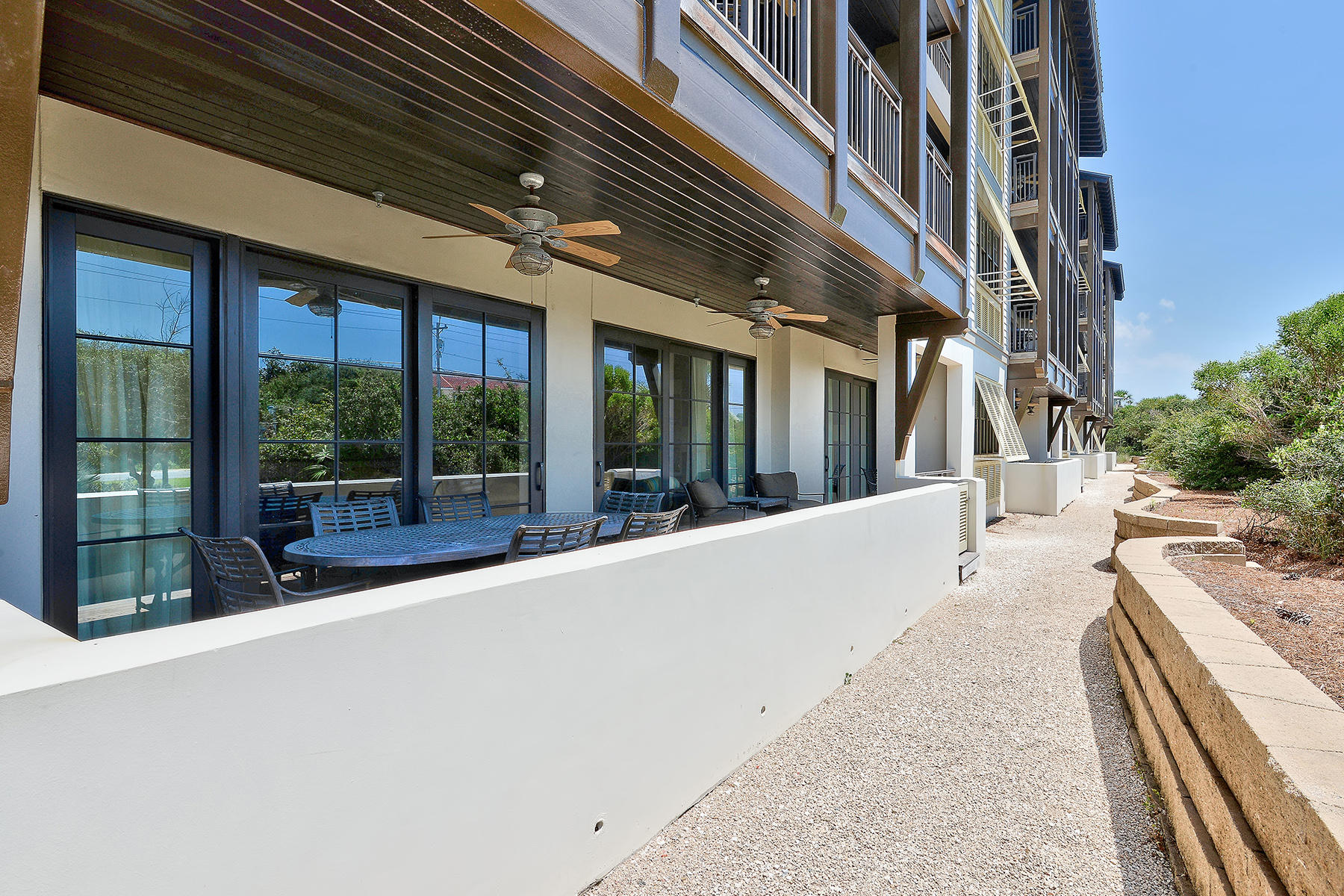 Experience living life to its fullest at Waterhouse, located directly on Scenic Highway 30A between WaterSound Beach and Alys Beach. Developed originally as a private residence club, Waterhouse exceeds ordinary expectations of what a condo development should offer, and effortlessly delivers an extraordinary vacation home lifestyle experience. This garden view residence located on the 1st floor is offered fully furnished and rental ready. On-site amenities include a unique rooftop deck with pool, spa, and grills, an owner's lounge with full-service kitchen and game room, an unparalleled fitness center with steam sauna, dry sauna, and locker storage, as well as beach access immediately across 30A.