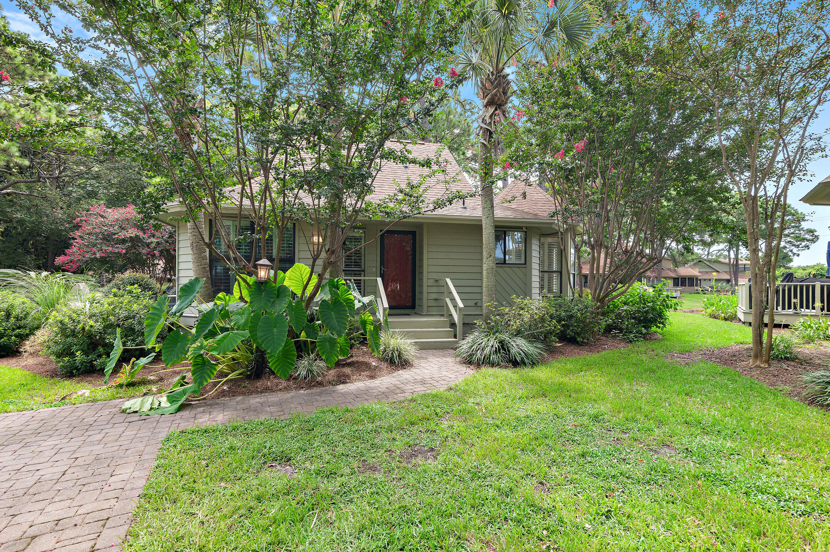Welcome to resort living in the Sandestin Golf & Beach Resort! This appealing two-bedroom, two bath Fairways single-story cottage serves as a an ideal retreat, perfect for a vacation home, investment property or primary residence. NEW ROOF IN 2025; This home sold fully furnished with a short list of exclusions.This home has never been rented by the current owner. Surrounded by mature trees, this home offers exceptional resort living with a finished bonus room, a screened -in porch, a spacious storage room/workshop, and utility sink. The versatile bonus room can easily function as a third bedroom, an additional living area or an office. The kitchen has been meticulously renovated featuring stainless steel appliances, granite countertops, under cabinet lighting and soft close drawers Plantation shutters throughout.
Newly constructed neighborhood pool is located nearby.
Sandestin offers an array of amenities, from the pristine white sands and clear turquoise waters of The Gulf of America to the marina near at Baytowne Wharf and the diverse shopping and dining options at Grand Boulevard. This Florida cottage is perfectly situated to enjoy all the perks Sandestin Golf and Beach Resort has to offer.
