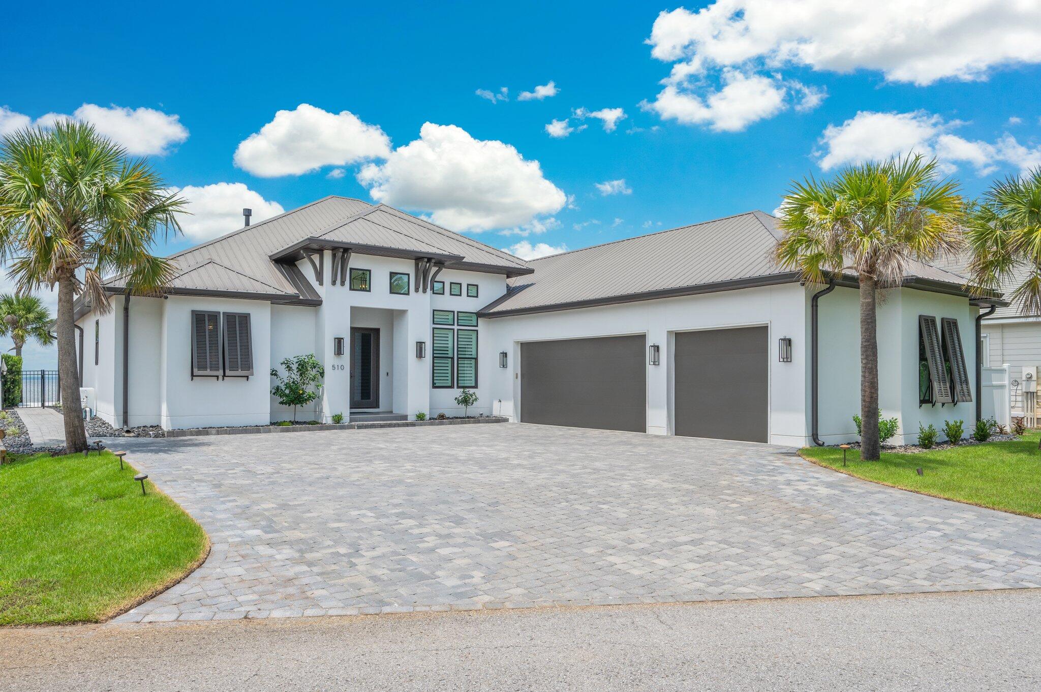 BAYFRONT LUXURY LIVING - PRIVATE DOCK, POOL, AND PANORAMIC VIEWS! Experience the ultimate in upscale coastal living with this custom-built Bayfront masterpiece, thoughtfully designed to capture sweeping water views from nearly every room. This stunning home offers a seamless blend of refined indoor comfort and exceptional outdoor living. The gourmet kitchen is a showstopper, featuring a large island, and quality SS appliances. Outside, paradise awaits. Enjoy a private boat dock with lift, jet ski lift, and swim platform - ideal for fishing, dolphin watching, or sunset cruises from your backyard. The covered patio, outdoor fireplace & summer kitchen overlooks a sparkling private pool & tranquil water fountain! Oversized 3-car garage, and amazing location! Waterfront living at it's finest! This prinstine property comes with a tremendous amount of additional upgrades, such as:
a 27kw Generac whole house generator installed in 2024, New AC's installed in April '2024 as well as a tankless hot water heater and an outdoor rust removal water system for irrigation. This property includes everything a meticulous buyer could ask for.