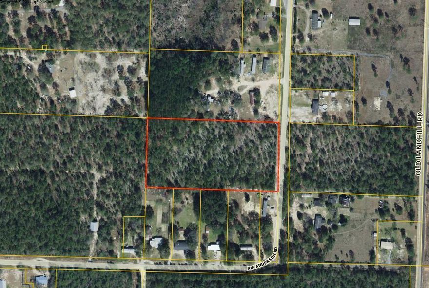 5 acres with a perfect location near the city and yet in the country. Enough land that you do have privacy.