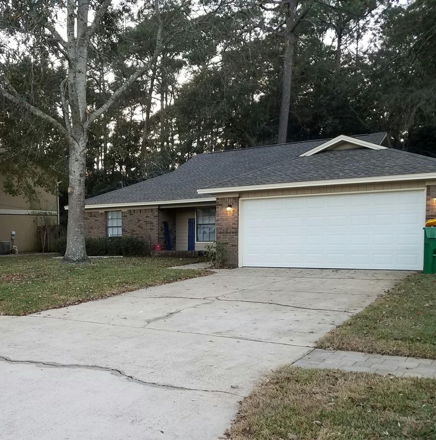 Desired neighborhood with the PERFECT home. This 3 bedroom and 2 bathrooms home is perfect from the start. Beautiful new landscaping with st. Augustin sod that completes the front and back yard. New glass panes in the windows. NEW kitchen. The kitchen is oversized with beautiful cabinetry. It's soft close drawers and doors accented by the grace items make you feel right at home. Dark espresso floating laminate flooring runs throughout the living areas to really make it pop. Both bathrooms are white and bright with gorgeous marble look alike tile and a nice glass mosaic to accent. The master has an oversized garden tub to relax in after a long day of work. Each bedroom also has new carpet to make them feel so cozy.