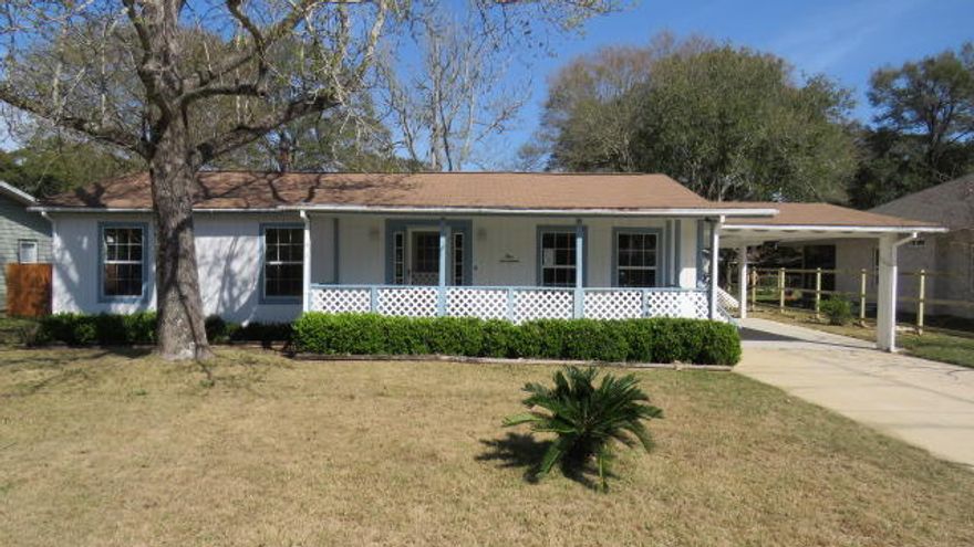 With a little love, this very cute 3 bedroom, 2 bath ranch style with and attached carport would be a great home! The home features an open floor plan with room to grow, a cheery black and white kitchen, hardwood flooring, a fireplace in the master bedroom and a separate building that could be a hobby room or an office. The location is convenient to shopping, Schools, Military Bases and employment opportunities.