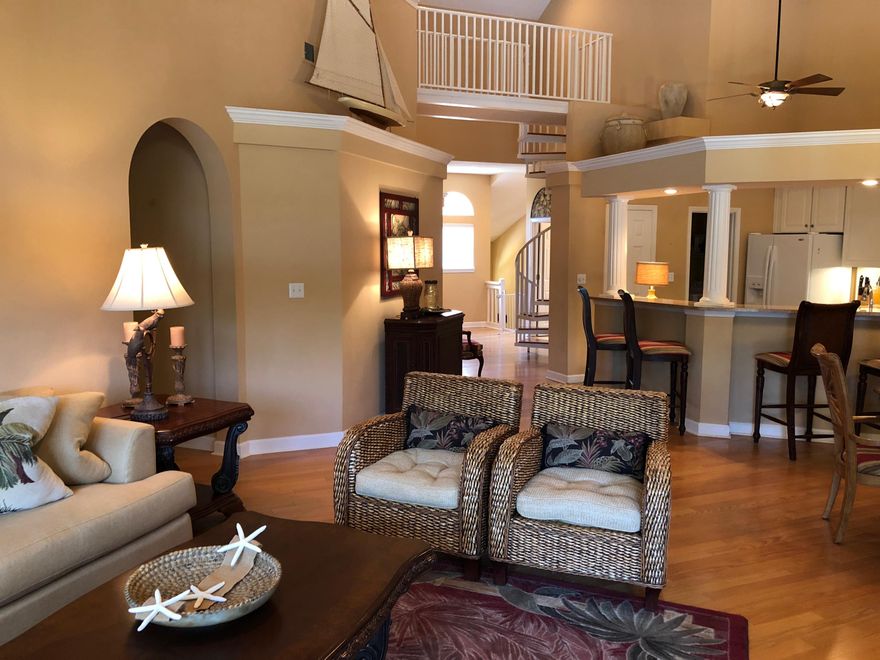 Price just reduced on this lovely, spacious and wonderfully located 2nd floor, poolside unit located in Tivoli By The Sea, inside the south gates of the Sandestin Beach and Golf Resort and within walking distance to the beach! Here is one of the largest floor plans offered with it's three large bedrooms and three full baths, all on the main floor, and a bonus 4th bedroom and 1/2 bath in the large loft area on 2nd level. BIG! The kitchen has been updated with granite countertops and includes a pantry for added storage. The unit can easily sleep 11, the living room can comfortably accommodate the entire family and the dining area and breakfast bar can seat 10. The full sized laundry room offers good storage, and there are many closets for even more storage! Selling fully furnished. The bedroom carpets and tile flooring has just been professionally cleaned, and the unit sparkles. The outdoor screened lanai is another fabulous space.  It overlooks the neighborhood of Tivoli's private swimming pool and lush landscaped grounds. 
Parking is located right out in front of the unit and the tram, which goes to the beach, bay and all points in between, picks up is just a few steps away.  It is a very well located property.  This unit is currently being enjoyed as a vacation home by it's owners and is not on the rental market.  But, investors take note, these large units located on the south side of the resort are prime rental income producers... 
Don't miss viewing this one, and please call for your private showing. Owners say bring an offer...