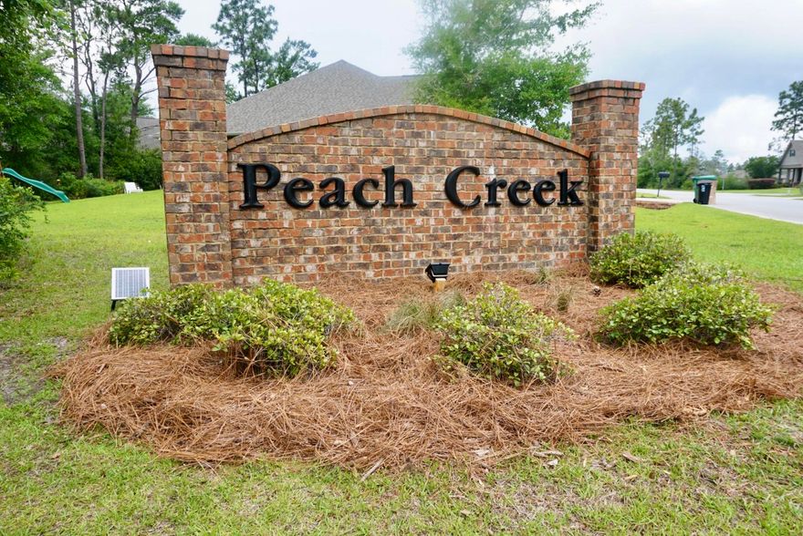The McKenzie floorplan is a 5 bedroom, 3 full bath, OPEN CONCEPT, ranch style home. This home boasts gray wood look tile flooring through out, white cabinets, beautiful Luna Pearl granite in the kitchen and all bathrooms,stainless steel appliances and irrigation for low maintenance lawn care. There is definitely enough space to accommodate all of your needs! A floorplan like no other, unbeatable value, and centrally located between Panama City and Destin.