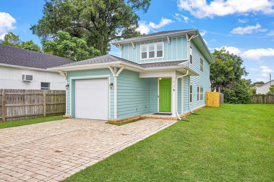 Centrally located in the historic Belmont-DeVilliers area, this beautiful home is in the heart of downtown! Just blocks from Palafox Street's popular farmers markets, dog-friendly bars, & top-rated restaurants, a block from Henry Wyer park, and only one mile from Blue Wahoos Stadium! Built in 2018 and lovingly maintained by its original owner, this property is packed with great features. Inside, you'll find prairie-style windows, 9-foot ceilings, cordless cellular blinds, a 1 car garage, engineered hardwood flooring, and a neutral paint palette throughout. With three bedrooms and three full bathrooms, including two spacious primary suites upstairs, the layout is ideal for families, guests, or roommates. The main living area boasts an open-concept floor plan and the kitchen features soft- close white cabinetry, stone countertops, stainless steel appliances, a gas range, breakfast bar, and a pantry. Each bedroom includes a walk-in closet, ceiling fan, and blackout cordless blinds. The main-level bedroom has direct access to a full bathroom just off the kitchen - an ideal setup for guests. Upstairs, you'll find a spacious laundry room and the two additional bedrooms, each with en suite bathrooms. The primary suite is oversized and includes two walk-in closets, double vanities with stone countertops, and a floor to ceiling tiled walk-in shower with a rain head fixture. The third bedroom, located across the hall, boasts abundant natural light and a private bath with a tiled tub/shower combo and stone-topped vanity. Out back, enjoy a private retreat with a fully fenced yard and a covered porch with ceiling fan, allowing you to relax in the Florida summers. An outdoor shed provides extra storage, and the one-car garage is fully equipped with epoxy floors, a workbench, built-in cabinetry, overhead storage, a workshop wall system, and a generator transfer switch! This downtown gem is move-in ready and offers easy access to all Pensacola has to offer!
