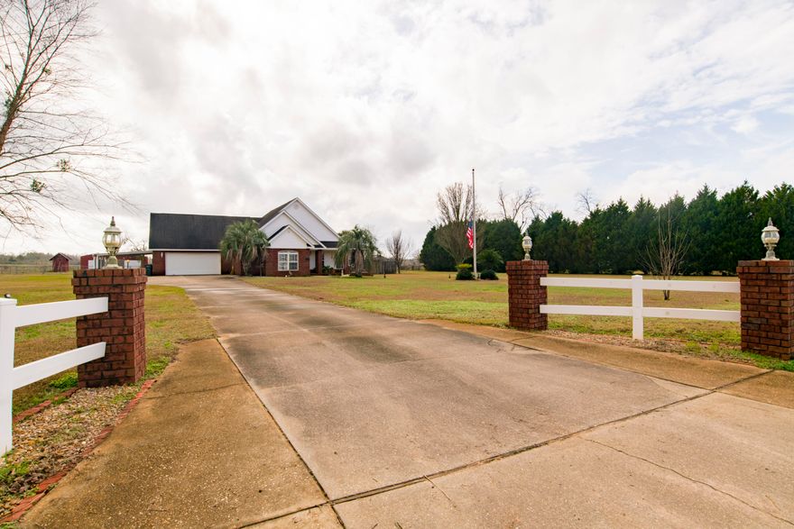 This modern country home situated on 2 acres, is zoned AG and has ample workshop space and also includes a 2 bedroom, 1 bathroom apartment/In-Law suite with a seperate, private entrance. The apartment has a full kitchen, it's own carport and climate controlled sun room overlooking the pool and is connected to the main house through the garage. This is a PERFECT setup for parents who still want to maintain their independence and would also make a fantastic airbnb or long term rental. The main house features an open floor plan, spacious great room with vaulted celings, formal dining room and breakfast nook, electric fireplace and an upstairs bonus room. This room would make for a perfect study, gym, game room or play room. The kitchen boasts a large walk in pantry & cook's kitchen featuring This modern country home situated on 2 acres, is zoned AG and has ample workshop space and also includes a 2 bedroom, 1 bathroom apartment/In-Law suite with a seperate, private entrance. The apartment has a full kitchen, it's own carport and climate controlled sun room overlooking the pool and is connected to the main house through the garage. This is a PERFECT setup for parents who still want to maintain their independence and would also make a fantastic airbnb or long term rental. The main house features an open floor plan, spacious great room with vaulted celings, formal dining room and breakfast nook, electric fireplace and an upstairs bonus room. This room would make for a perfect study, gym, game room or play room. The kitchen boasts a large walk in pantry & cook's kitchen featuring a large island, corian counter tops, and breakfast bar. You'll also enjoy recessed led lighting throughout the home, central vac for the main house and apartment, ceiling fans in all rooms, surround sound & networked with a patch panel. Wired for easy generator hook up. The spacious yard with an inground pool is nicely landscaped, creating a true oasis environment. Enjoy a quiet afternoon fishing from your dock with a pond stocked with brim and relaxing under your large gazebo with fire pit enjoying those chilly winter nights outside while entertaining. The pond also as a fire truck hook up for an insurance credit. Plenty of guest parking with a long driveway, carport and two car garage. There are 2 oversized workshops as well. The first measures 35'x40' and an enclosed Pole Barn that measures 30'x50' large enough for RV and boat parking. Attached to the back of the Pole Barn is another shop that measures 12'x24'. Don't forget to bring your horses and toys! There is plenty of room for all! All measurements and details to be confirmed by Buyer or Buyers agents.