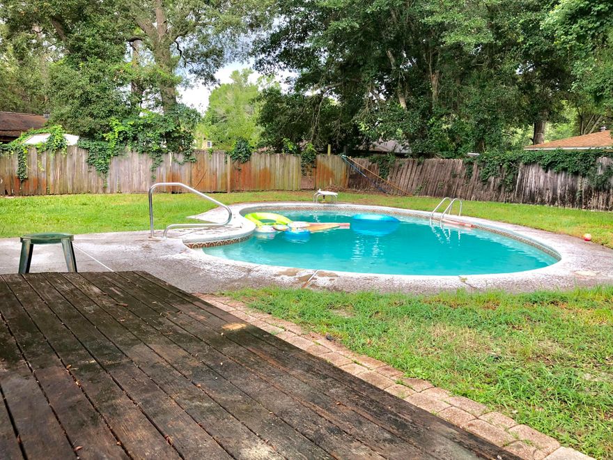 Priced well below market value! Come and see this 1 story ranch home with a pool close to everything Fort Walton Beach has to offer! Wonderful large back yard with in ground pool and privacy fenced yard. Interior living space is open concept with the kitchen, living, and dining in one big great-room! Master bedroom is large and has its own ensuite bathroom. The other 2 bedrooms are a good size and feature a hall bathroom.All windows have been upgraded to hurricane rated windows! You will also love the oversized 2 car garage. The best part? NO HOA! Bring your boat and make yourself at home. Additionally, you are within walking distance to Choctawhatchee High School and Pryor Middle School.