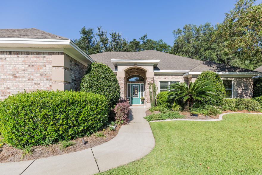 This gorgeous, extremely well maintained, custom built, all brick home is located in the very desirable Kenwood subdivision. This home has 4BR's & 3BA's and has 2330sqft. It has 10ft ceilings with crown molding in the living areas. Tile and hardwood throughout.The kitchen is a chef's dream with all SS appliances and beautiful granite counter tops and plenty of storage.The island has a custom built removable cutting board to make cooking for a crowd a breeze,The HVAC was replaced in 2014 and the inside has recently been painted throughout Enjoy the backyard patio with two gas-lines for grills that feels like a retreat in the Forrest, with mature trees and landscaping The 2car garage is spacious and there is a concrete pad for boat parking.This is beautiful home is a Must See!