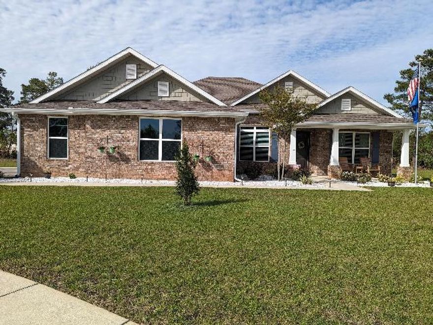 Beautiful home nestled in a quiet cul-de-sac in Windswept Estates golf course community.  Open floor plan ideal for entertaining. Built in 2020, this 4 bedroom/3 bath home features a split floor plan with both a formal dining room and breakfast area. Two guest bedrooms share a jack and jill bath, third bath features a walk-in shower. Owner's suite features his and her closets, double vanities, separate tub and shower, and a cozy owners retreat. The kitchen includes stainless steel stove with double ovens and large pantry. Granite counters throughout and white soft-close cabinets with 42' upper cabinets in kitchen.  Laundry room large enough for a second refrigerator. The extended screened-in lanai includes the hot tub. The whole-home water softener is included.  HVAC with UV light. Whether you play golf or not, this community has something to offer for families and retirees. You will be conveniently located a short drive from the beautiful beaches and the exciting amenities of a resort area, but far enough away to offer peace and tranquility away from it all.