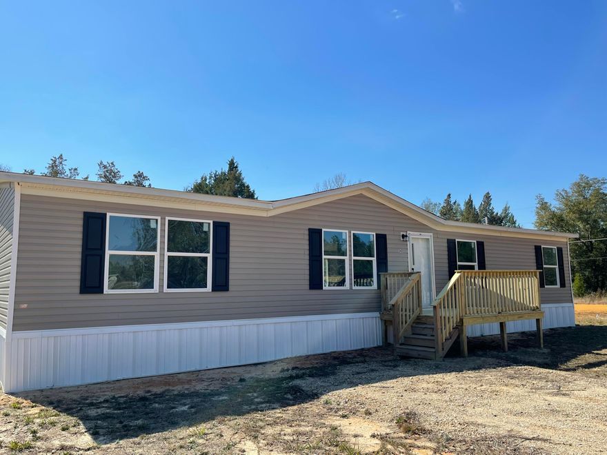 This Brand NEW 4-bedroom, 2-bathroom home is MOVE IN READY. It's open floor plan has wall to wall laminate flooring throughout. This home is ENERGY EFFICIENT with OSB Wrap - House Wrap, Lux Low E Thermo-Pane windows that fold down for easy cleaning & maintenance. The kitchen features a large island with underneath storage and plenty of cabinets. Off the kitchen is a large laundry room with wire shelving and to the other side of the kitchen is a flex space that could be used for a den or a dining room area. The master bathroom has a walk-in closet. It also offers a shower/tub combo insert and a spacious countertop. This is a split floor plan home, and the opposite side of the home includes the additional 3 bedrooms with a full bath that includes a shower tub combo as well. The seller provides a 5-year homebuyer protection plan in place at the time of a successful closing. From this home it is approximately a 15-minute drive to historic downtown DeFuniak Springs, an hour drive to the beautiful white sandy beaches, and about a 20-minute drive to Crestview. Check out the virtual tour we have uploaded to get a better visual of the layout of the home. Staged photos and virtual tour are of model homes and may have a few different features than the actual home. The titles for this home have been retired so the buyer will not have any additional title transfer fees.