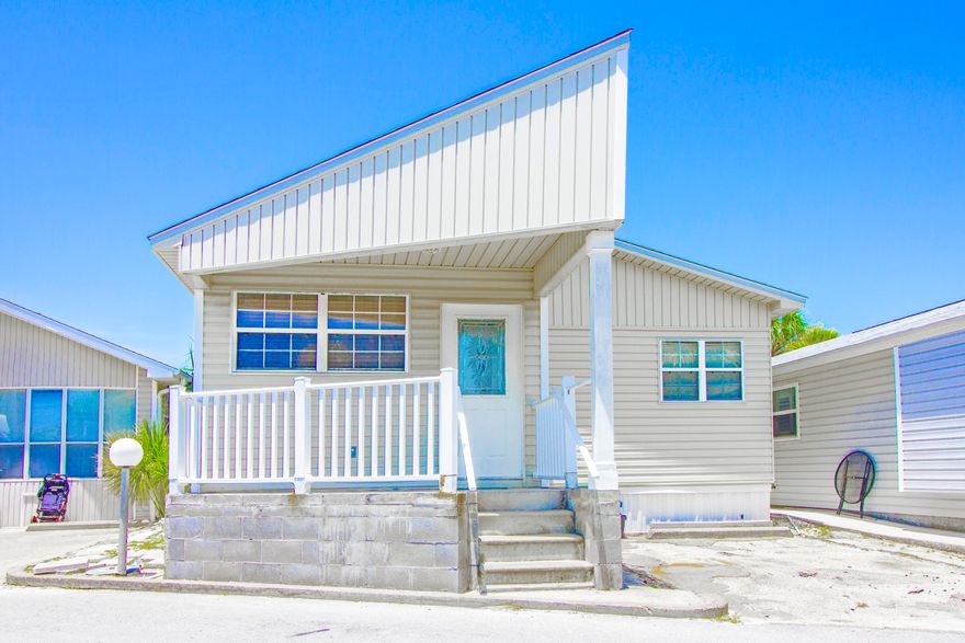 Spacious 2 bedroom 2 bathroom Venture Out home. Includes a golf cart with the purchase. Great location in a subdivision that offers it all! Back heated pool, pavilion, fishing pier, boat dock, tennis courts, shuffle board, put put golf course, playground, basketball court, front pool, office, club house, front pool, private beach access and much more you must check out for yourself.