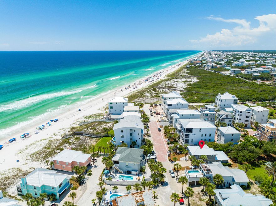 At 58 S Emerald Cove you will find forever gulf views, open concept living spaces, and a fresh and clean aesthetic. The large spacious kitchen includes luxury finishes such as granite countertops and extremely durable vinyl flooring...all within the neutral color palette which is currently on trend. Out back features a large custom deck with a commercial grill pad and outdoor shower. Perfect for entertaining and gathering outdoors. Imagine and redesign your ideal beach home only steps away from the sandy white beaches of Inlet Beach.  No HOA fees or regulations so the potential for remodel is endless- add a third floor to maximize vows and generate additional rental income. Direct access to Lake Powell- one of the largest and rare coastal dunes lake in the 30A area.