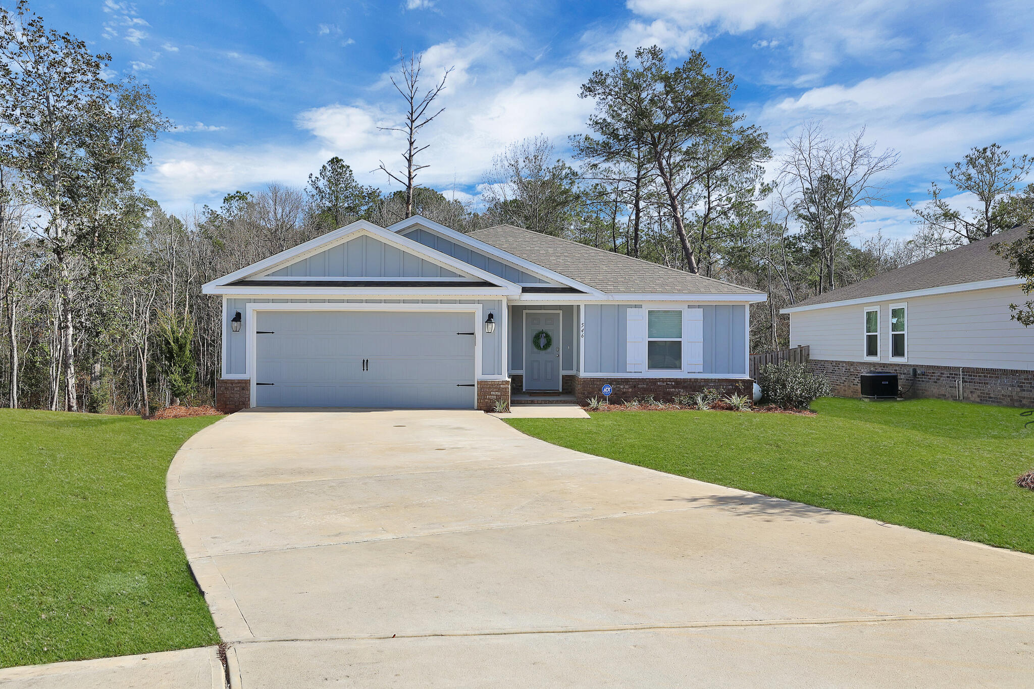 Experience the epitome of comfort and style in this immaculate residence! Presenting the exquisite Holiday Builder's most desirable split bedroom Dogwood floor plan. This move-in-ready home boasts 3 bedrooms, 2 bathrooms, and a seamlessly integrated open kitchen-dining room area that effortlessly flows into a spacious great room. Revel in the luxury of a 2021 built home. Indulge in the lifestyle you've always dreamed of with access to a community pool and gym, providing the perfect setting for relaxation and entertainment. The prime location adds to the allure, offering convenience just minutes away from local shopping and dining establishments. Embrace the coastal charm as you find yourself in close proximity to the breathtaking beaches of Walton County.