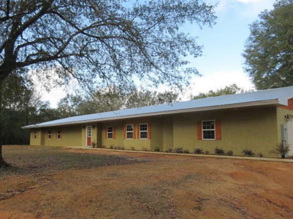 Very spacious 5BR/4BA has been completely remodeled from top to bottom. Home features anopen floor plan with a chef's kitchen, granite counter tops and beautiful cabinetry, stainless appliances and an oversized island/breakfast bar that seats 5.Large dining and living area. No Carpet, ceramic tile throughout, two master suites with double vanities and large tile showers.Two bedrooms feature jack-n-jill style bathroom with double vanity. Fifth bedroom/ office is found at front of home. Four of the bedrooms have oversized walk-inclosets. Two car garage and large laundry room, 24'x48' three stall horse barn with fencing, electric and water.