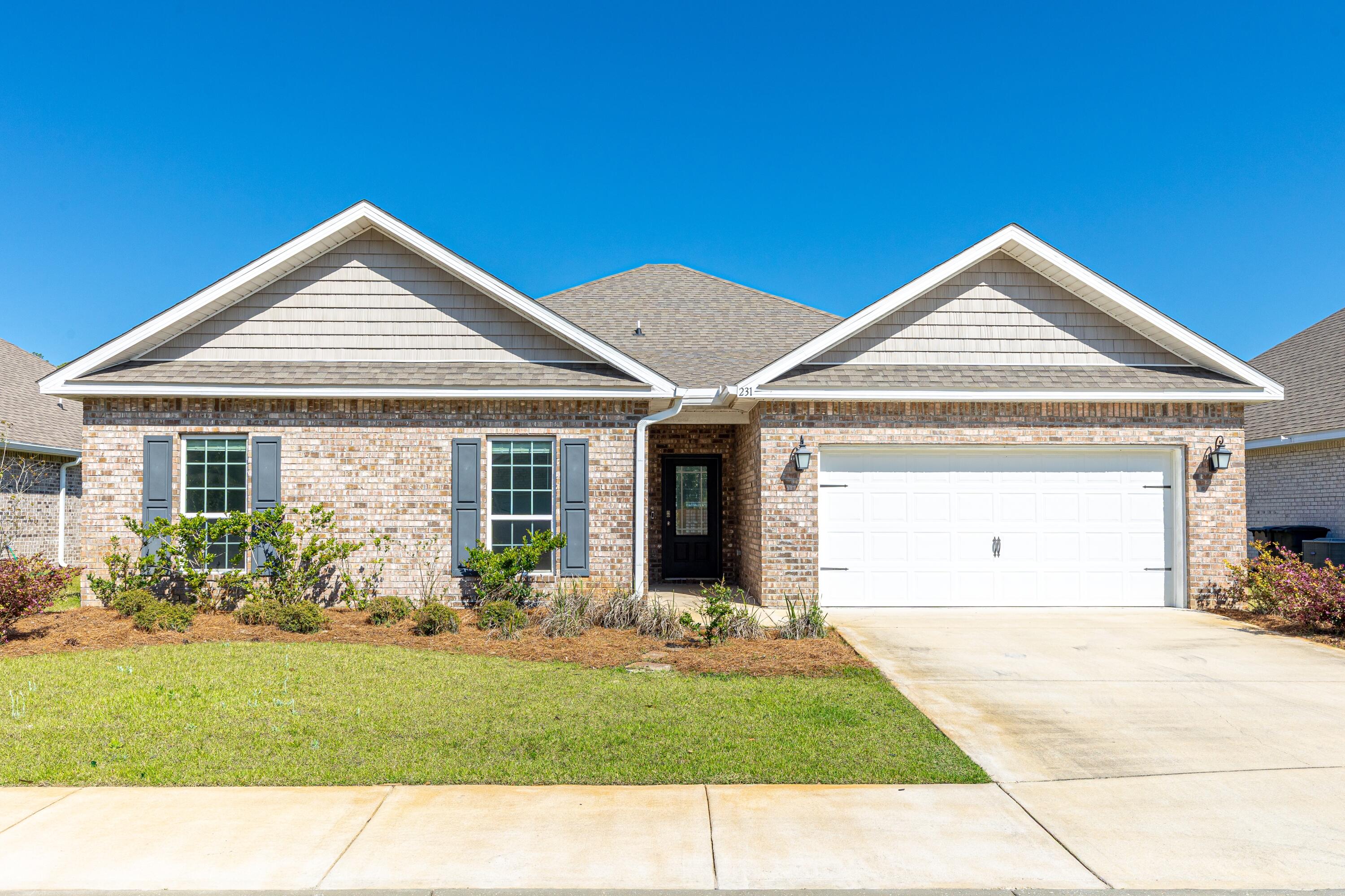 Situated directly off of Highway 98 North for quick access to Florida's Scenic Route 30A and the famous sandy white Emerald Coast Beaches. This four bedroom, two and a half bathrooms featuring 2,355 total square feet, an open concept living and eat-in kitchen area, provides ample space for entertaining, including the covered patio located in the backyard. Notable features include, two-car garage, crown molding, upgraded gray cabinetry, granite countertops, stainless appliances, walk-in pantry, master bedroom features a large walk-in closet. Peach Creek is centrally located with close access to fantastic schools, dining and the beautiful white sand beaches of 30a.
